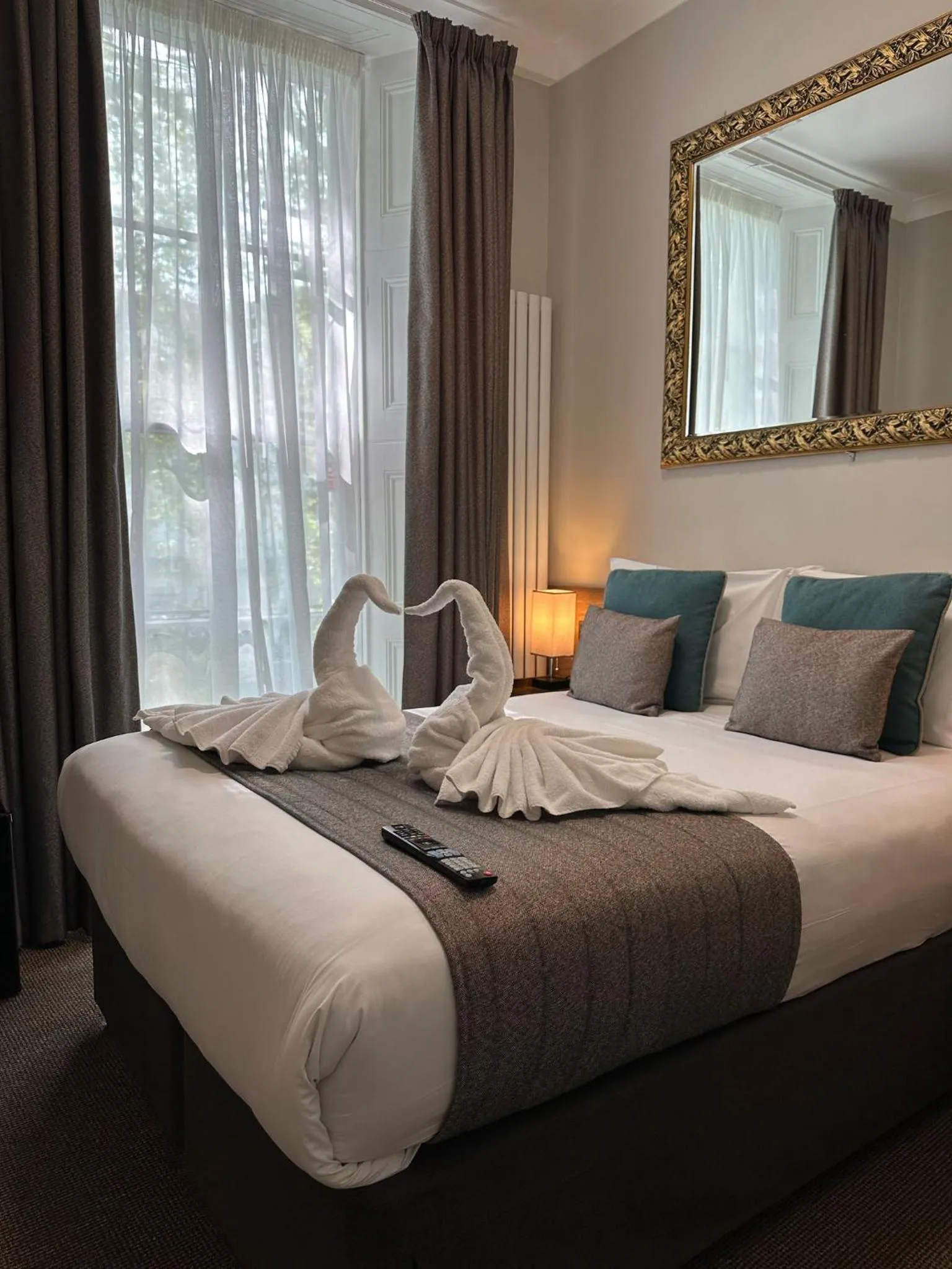 Bed in Tudor Court Hotel