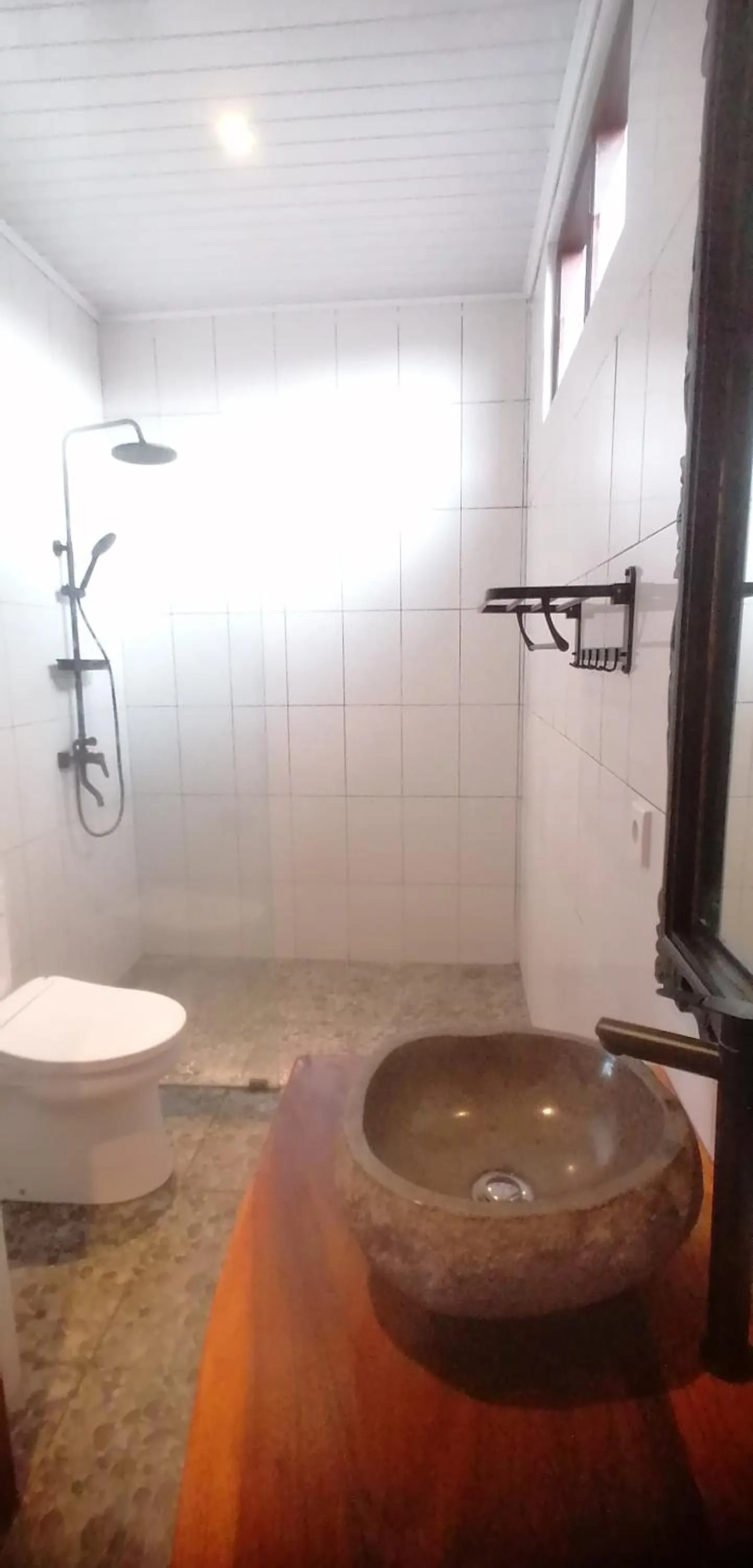 Bathroom in D'tegal Guest House- Tropical Courtyard in Canggu