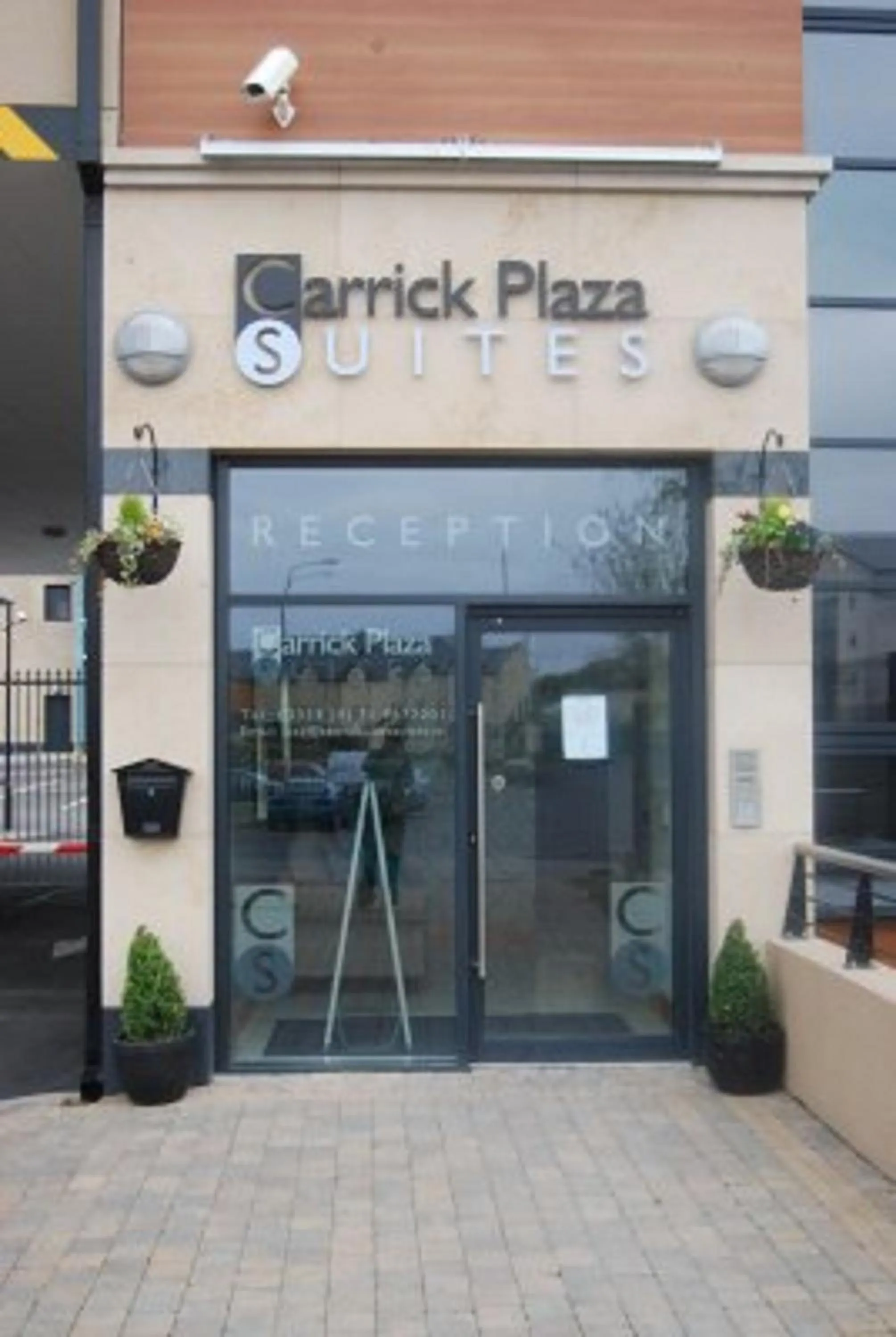 Facade/entrance in Carrick Plaza Suites and Apartments