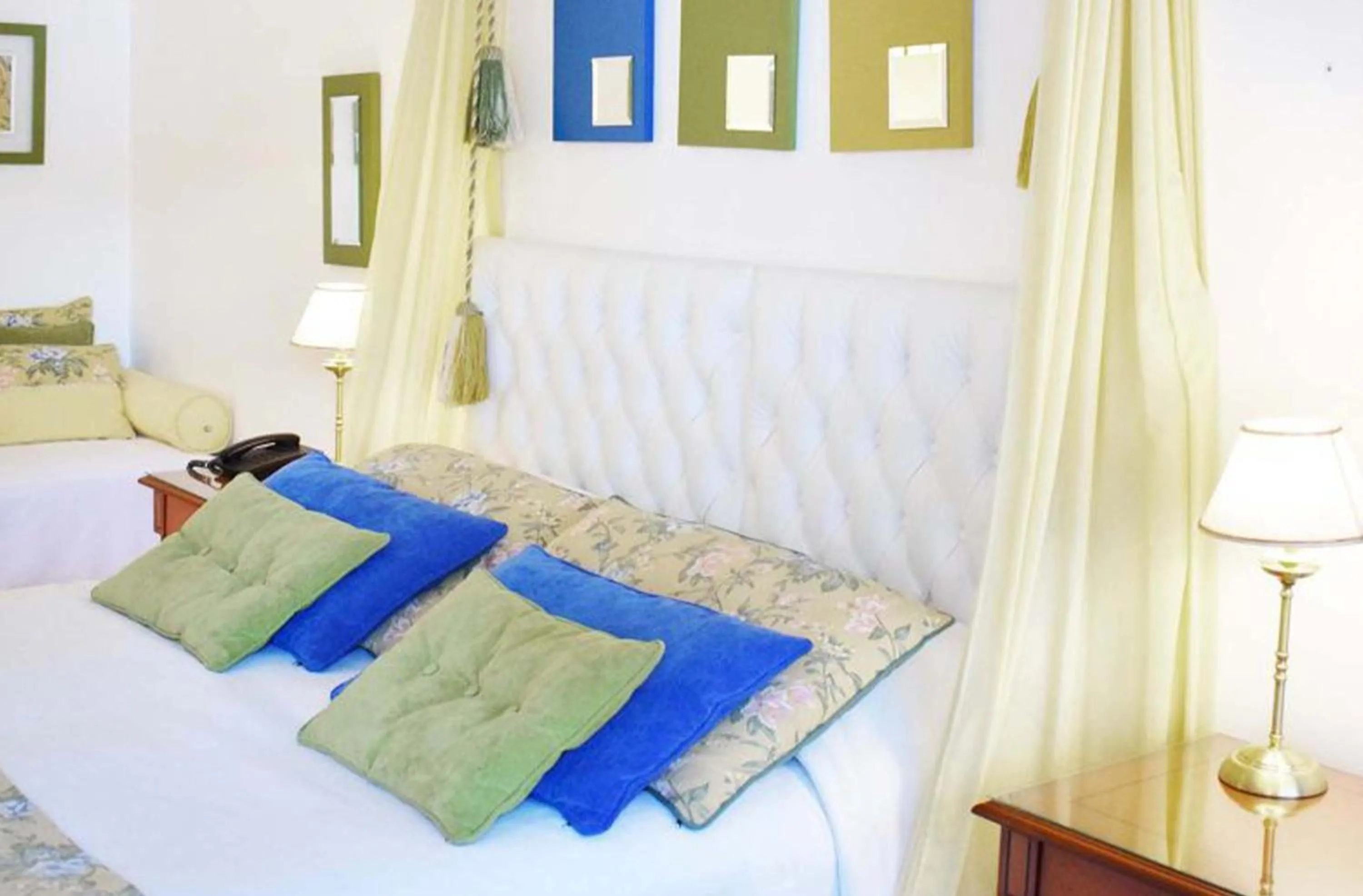 Bed in Posada Suiza by Prima Collection