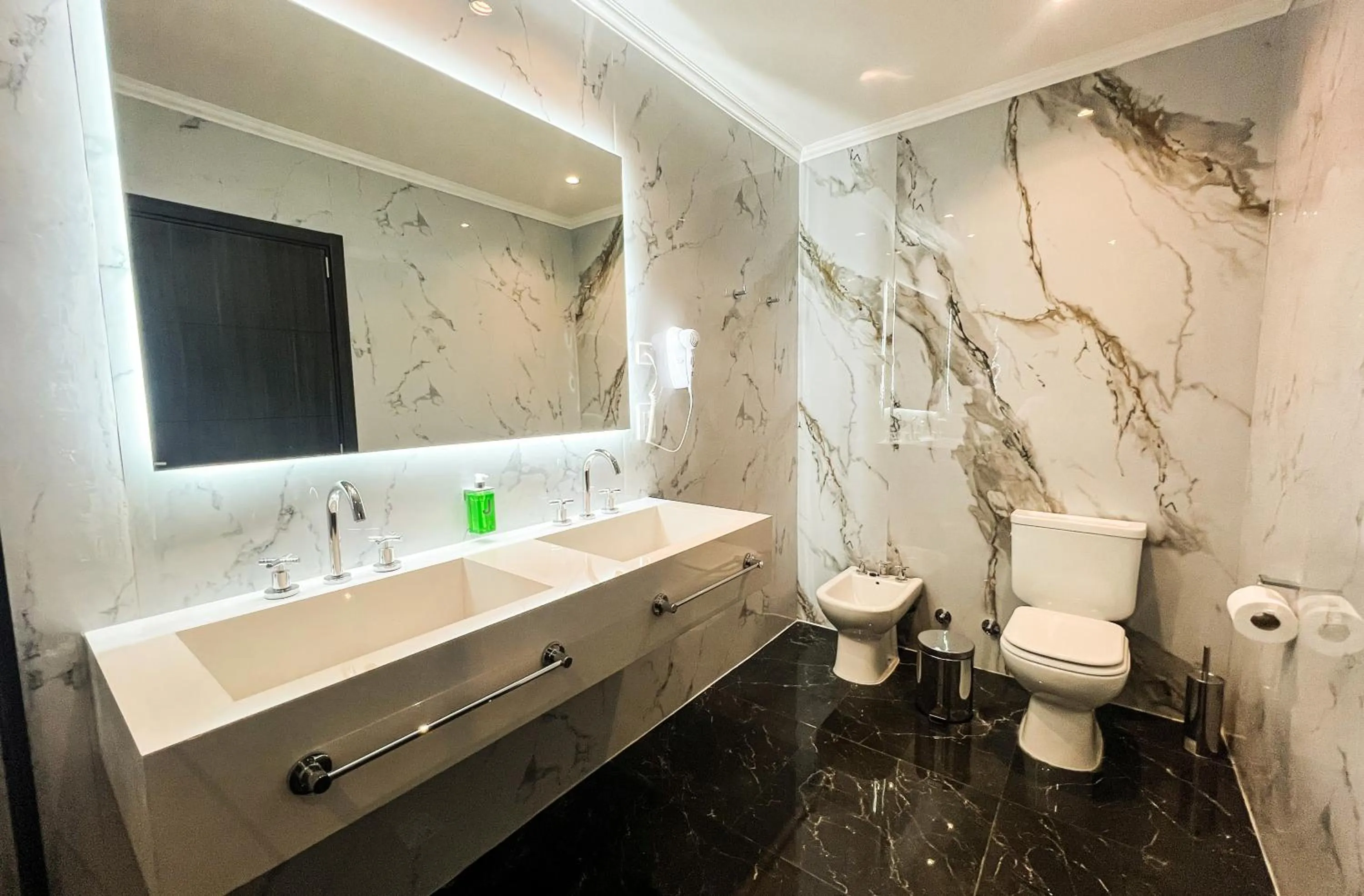 Toilet in Palmas de la Laguna by Posada Suiza