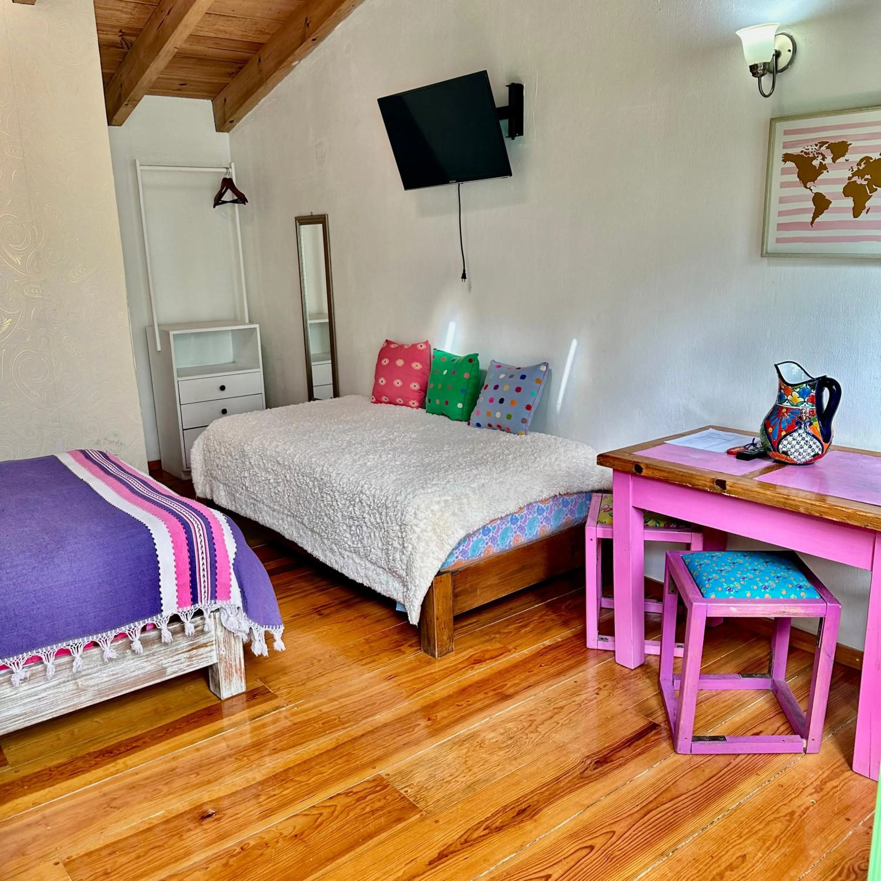 Bed in La Etelvina Suites