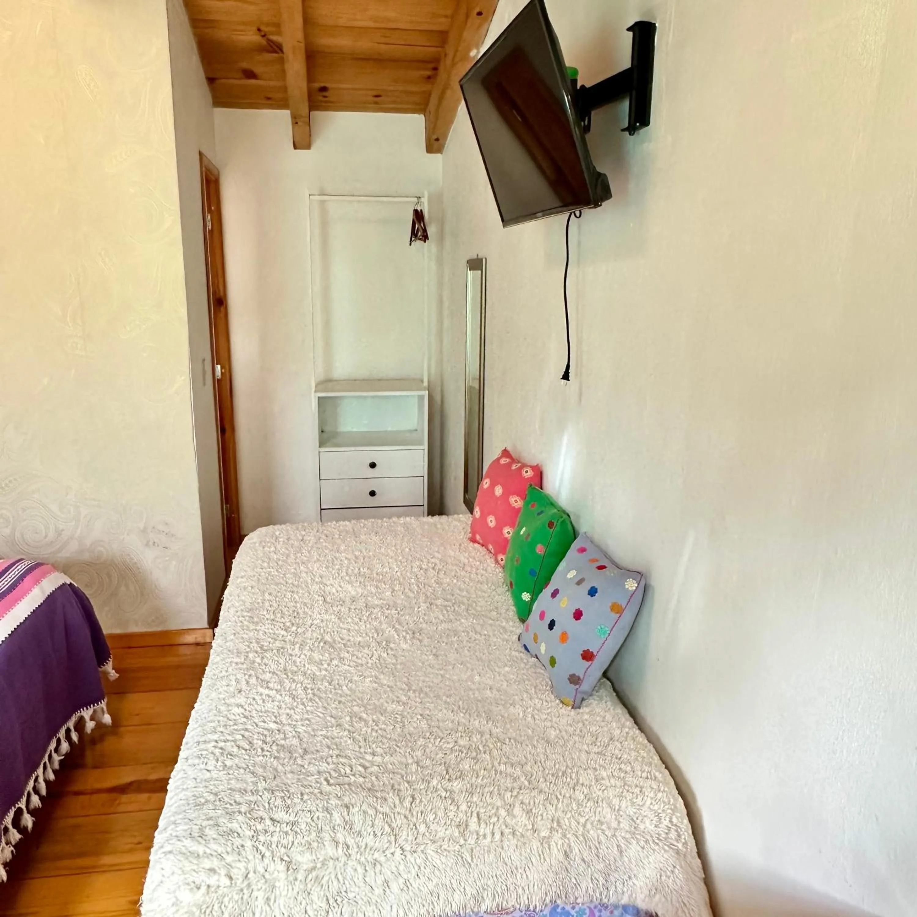 Bed in La Etelvina Suites