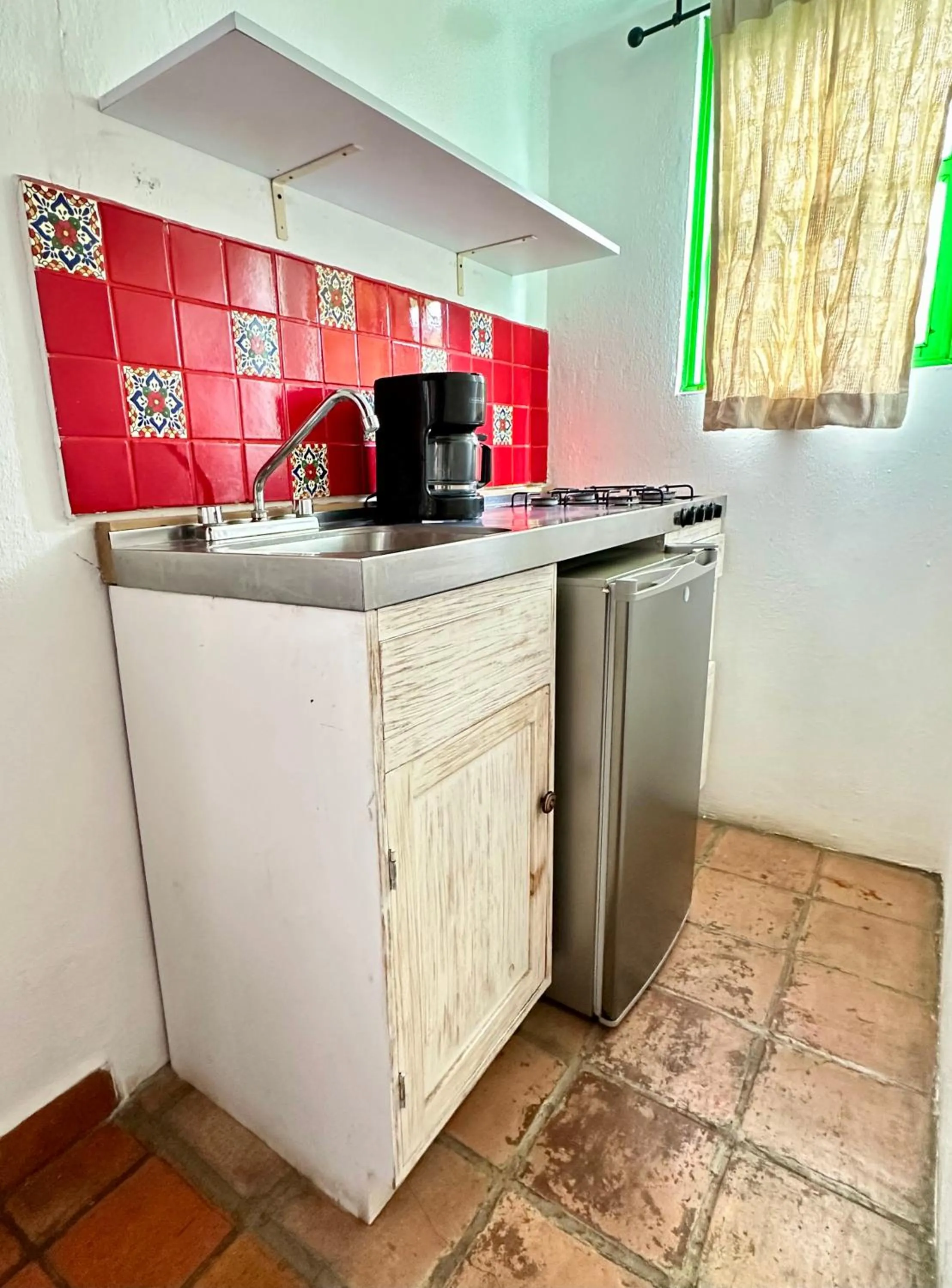 Kitchen or kitchenette in La Etelvina Suites