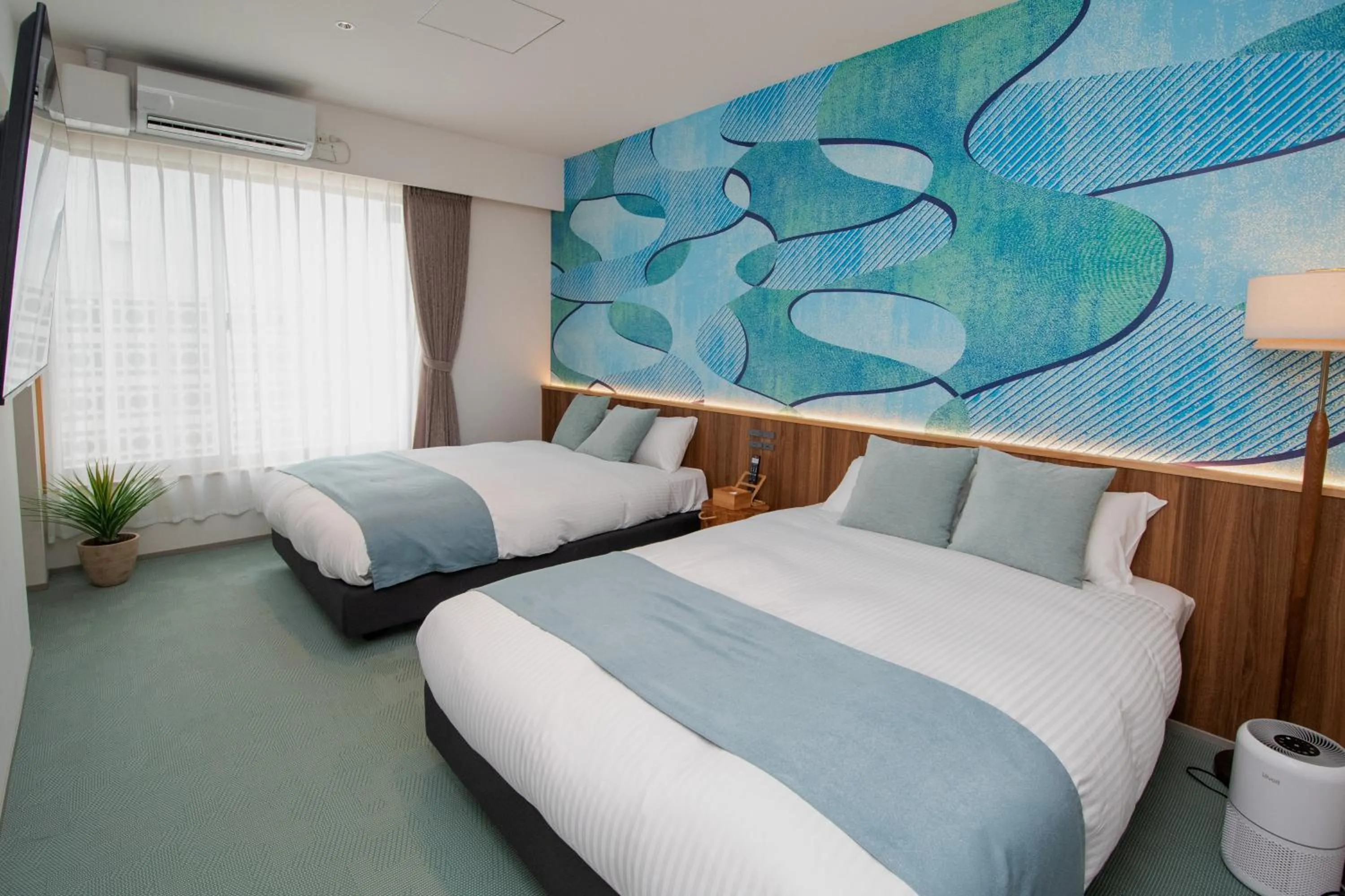 Bed in pool villa Sanrriott Okinawa Motobu