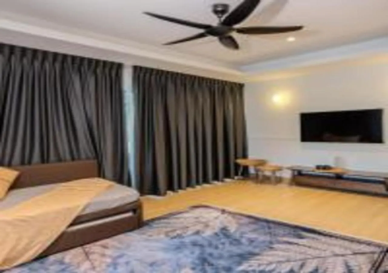 Bed in Suntai Villa, Beachfront Suites