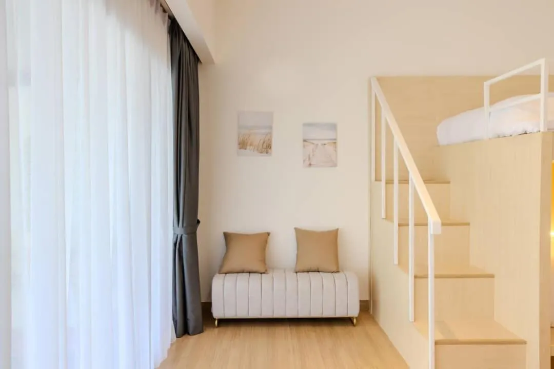 Seating area, Bed in Suntai Villa, Beachfront Suites