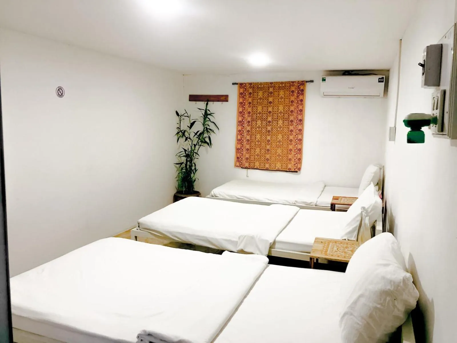 Bed in Tingkham Guesthouse