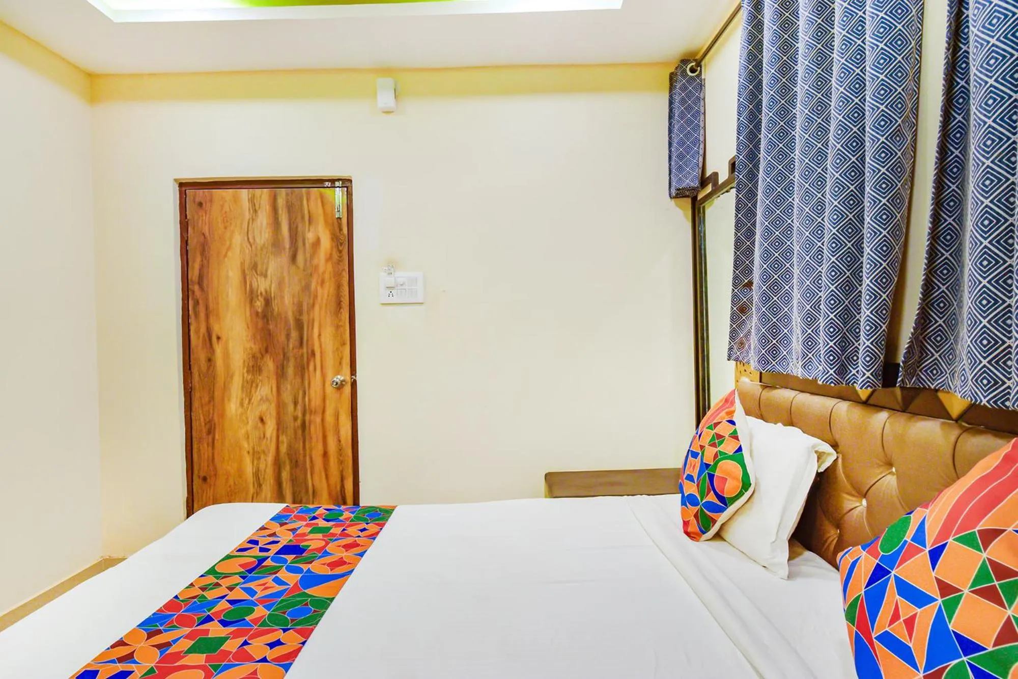 Bed in FabHotel Yogeshwara Grand - Nr Hyderabad International Airport, Shamshabad