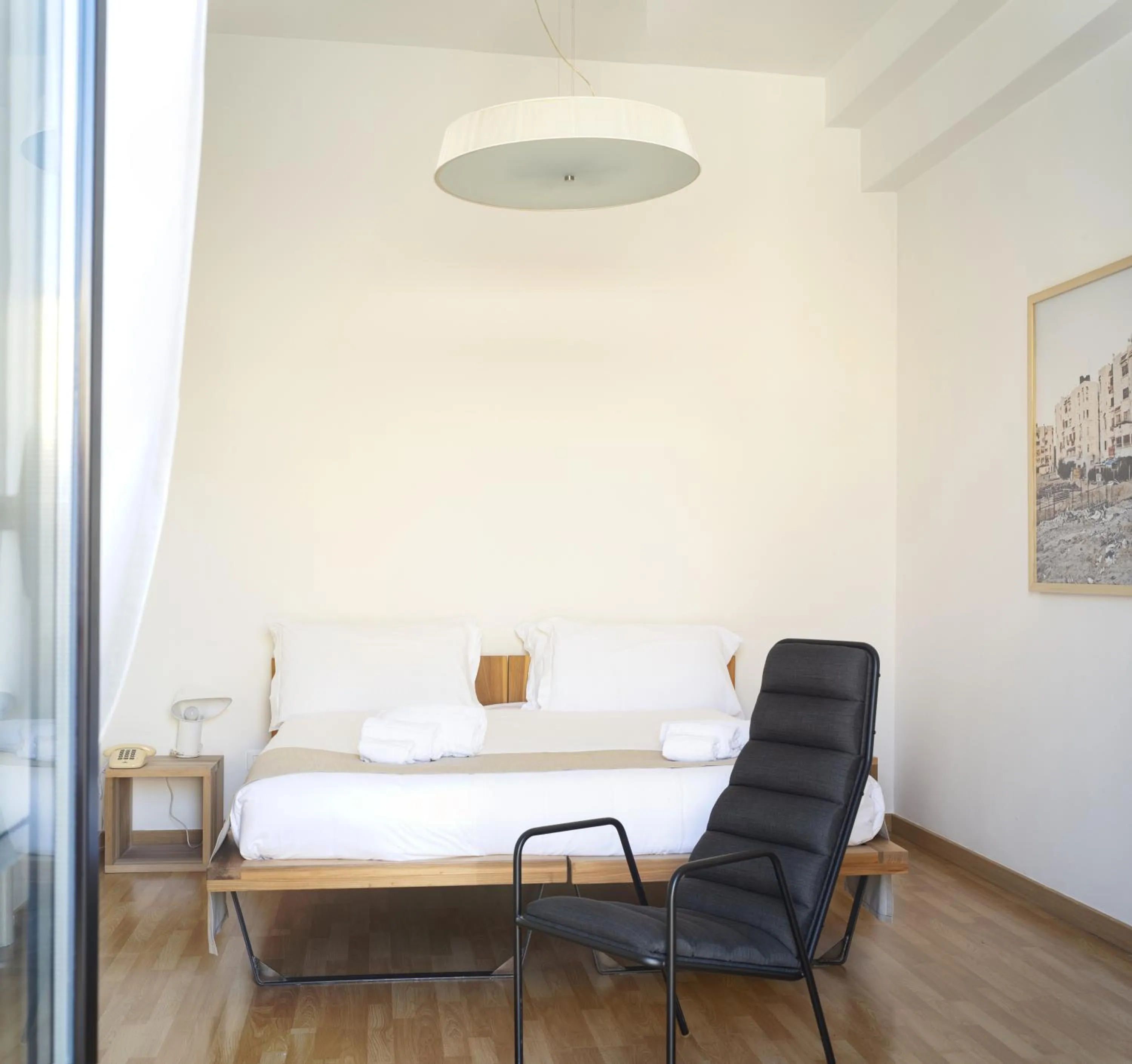 Bed in Imago Plus Hotel