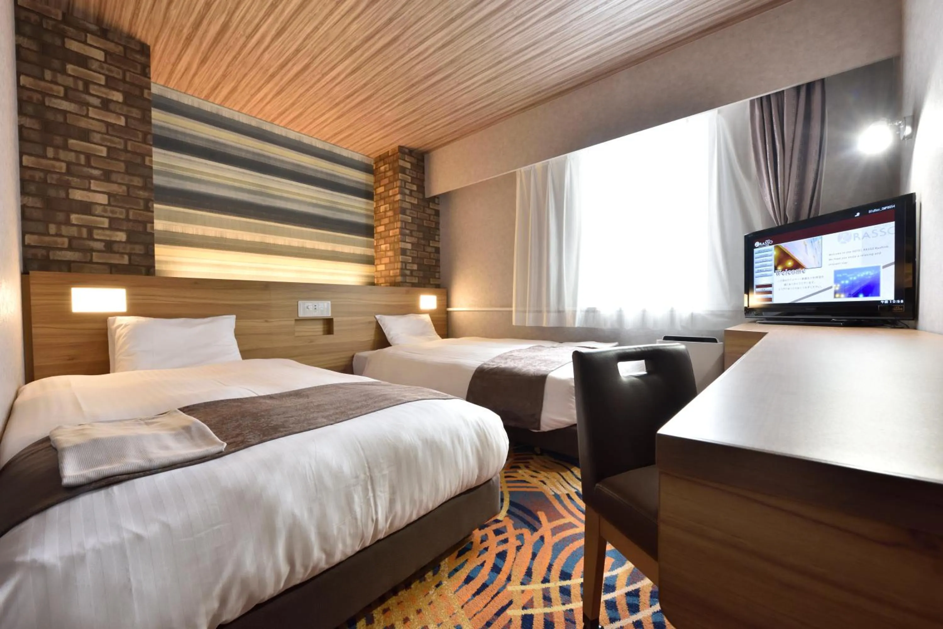 Photo of the whole room, Bed in Smile Hotel Kushiro