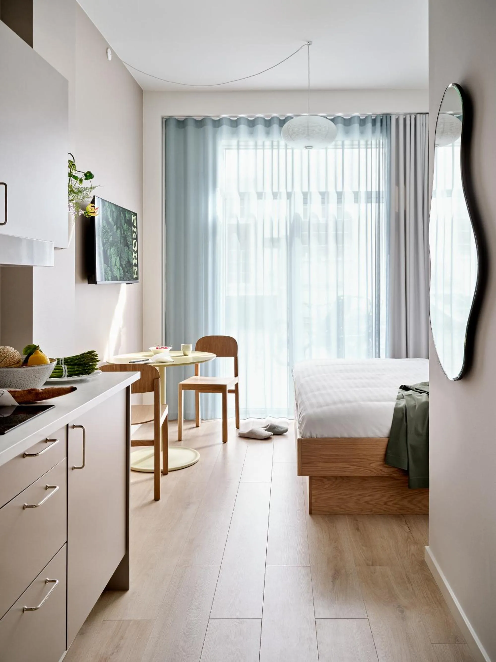 Bed in Flora Apartment Hotel