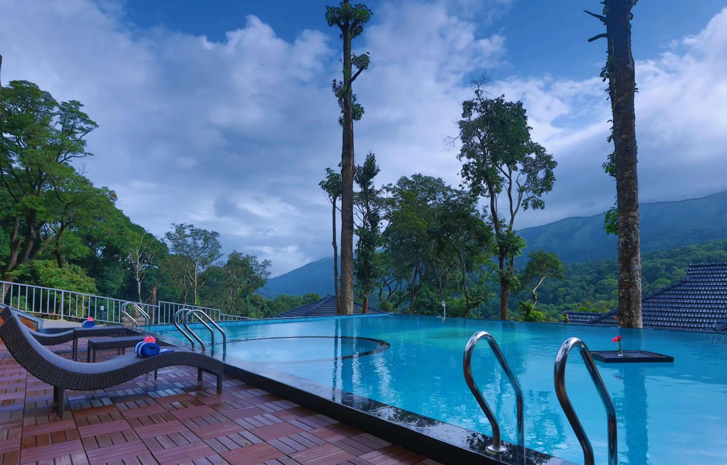 Swimming pool in Silent Brook Resort - Coorg