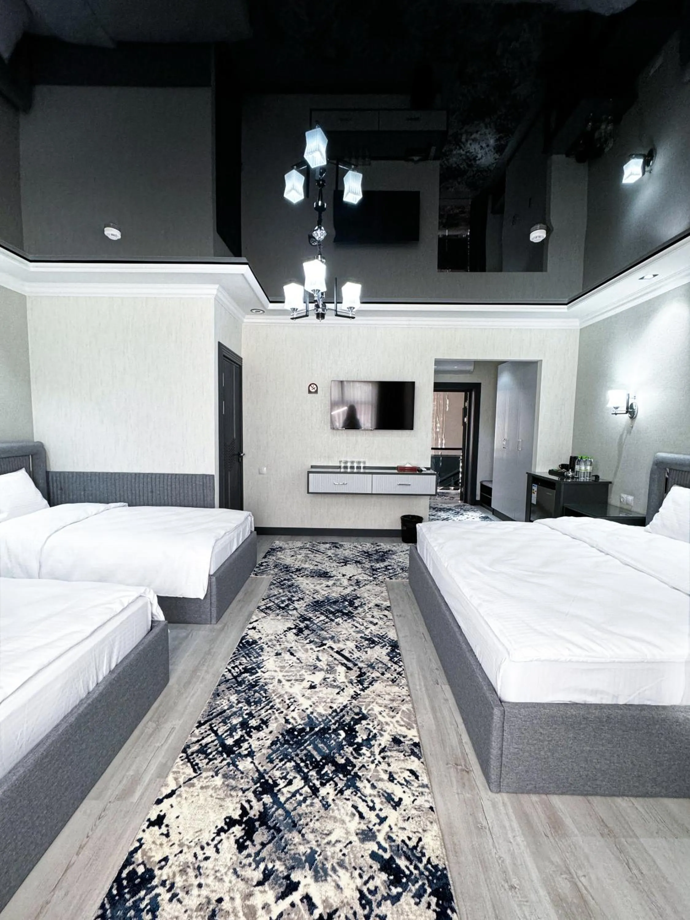 Bed in De Villa Hotel