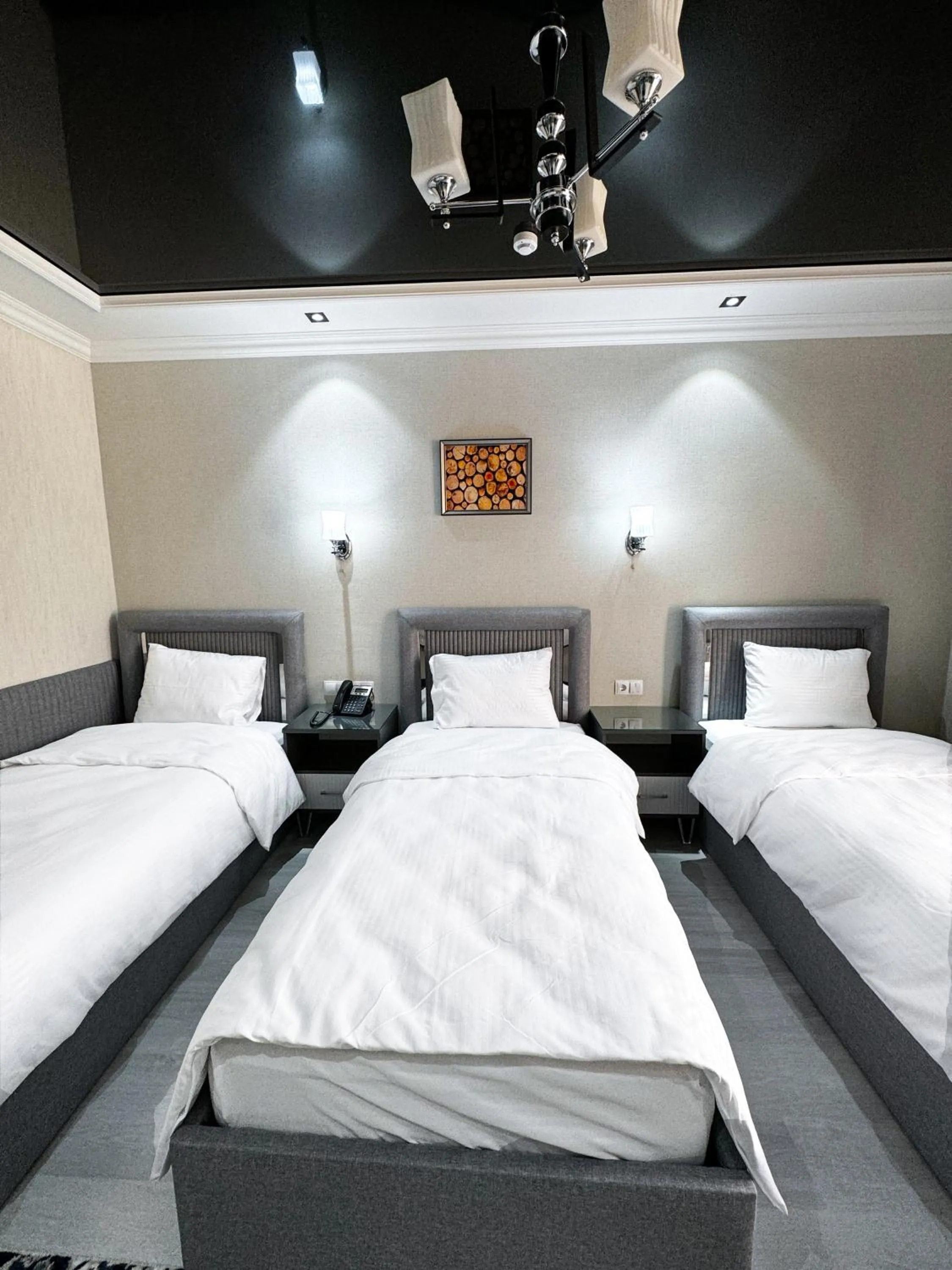 Bed in De Villa Hotel