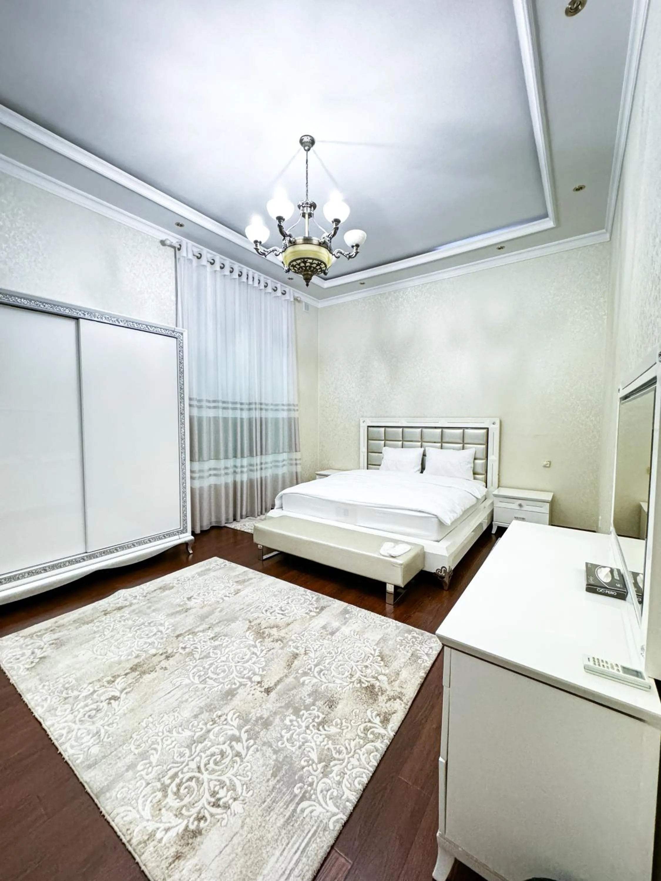 Bed in De Villa Hotel