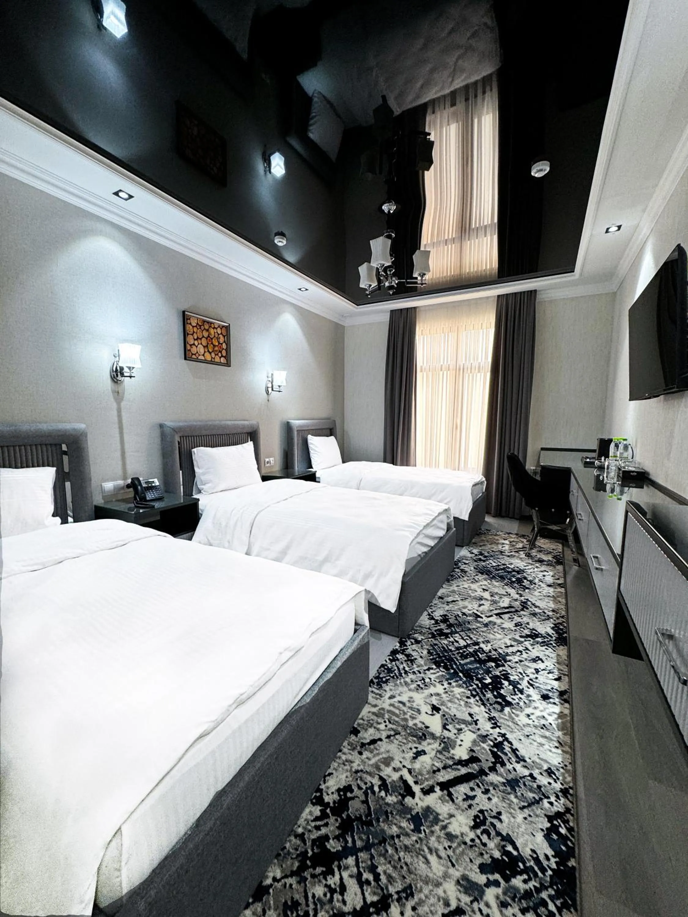 Bed in De Villa Hotel