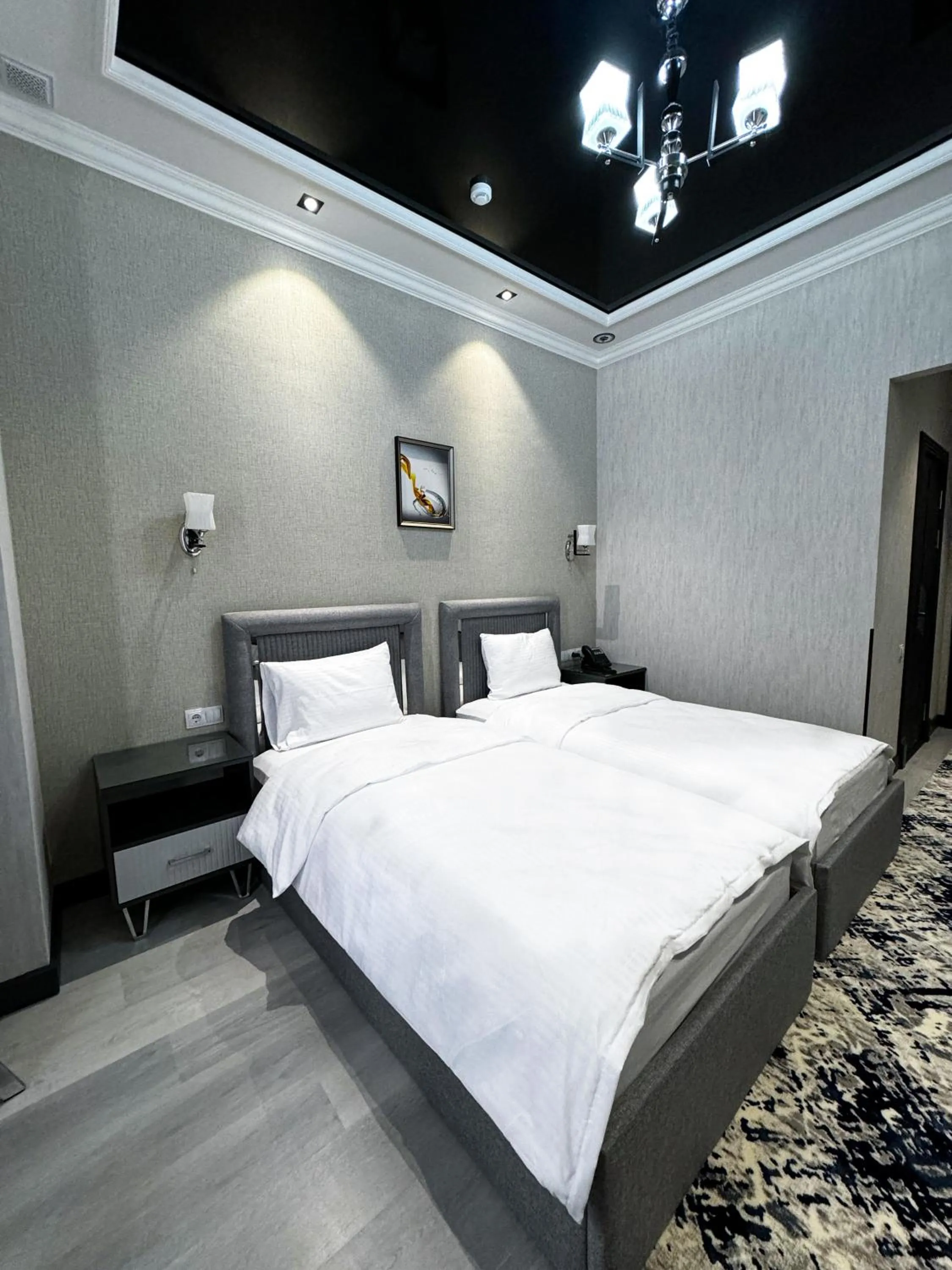 Bed in De Villa Hotel