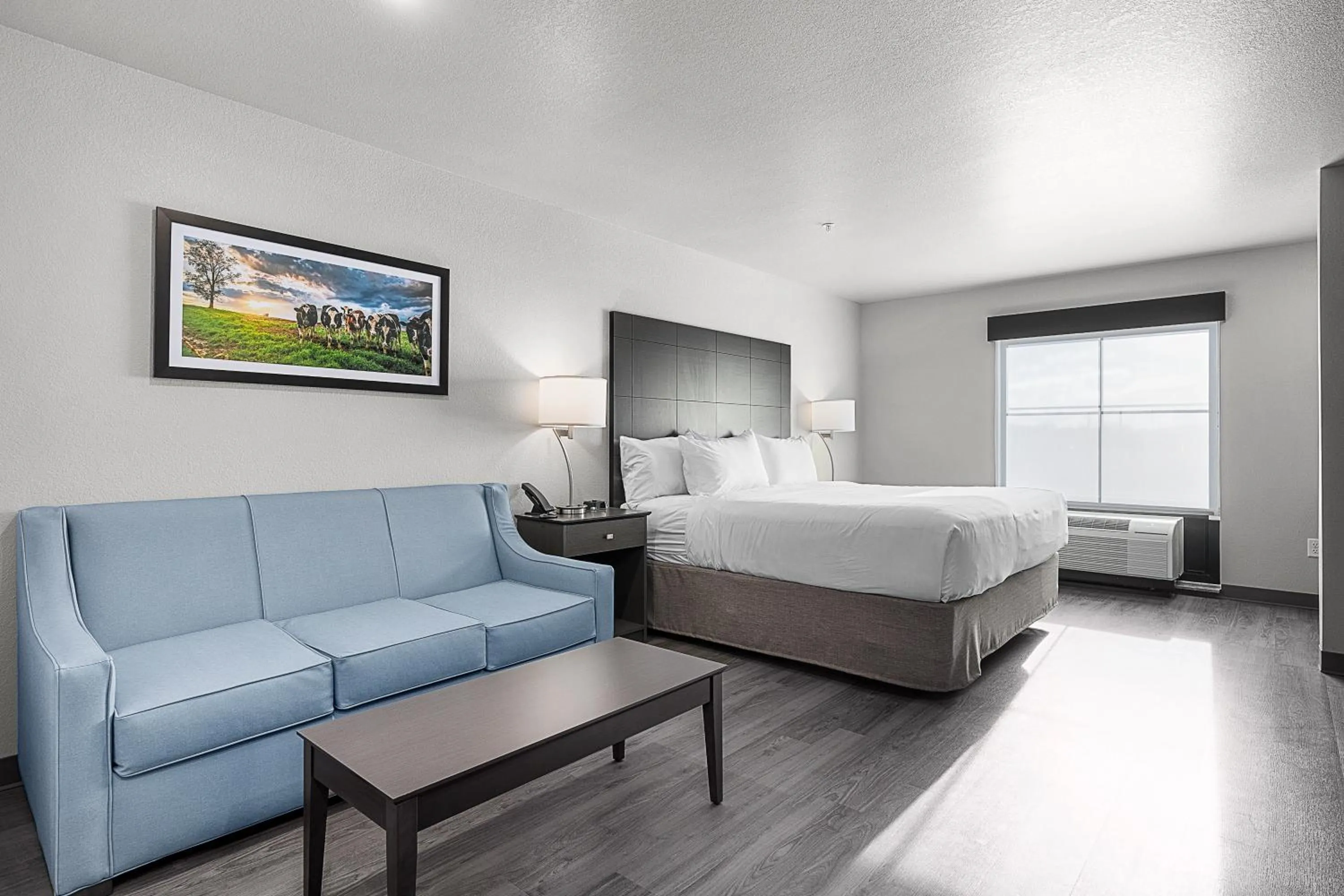 Bedroom, Bed in Riverstone Suites by Cobblestone Hotels - Chippewa Falls