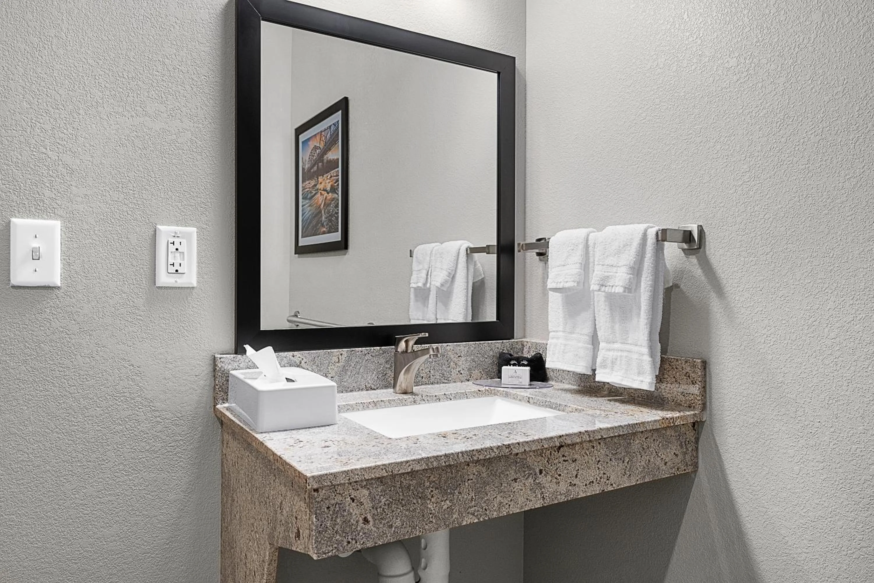 Bathroom in Riverstone Suites by Cobblestone Hotels - Chippewa Falls