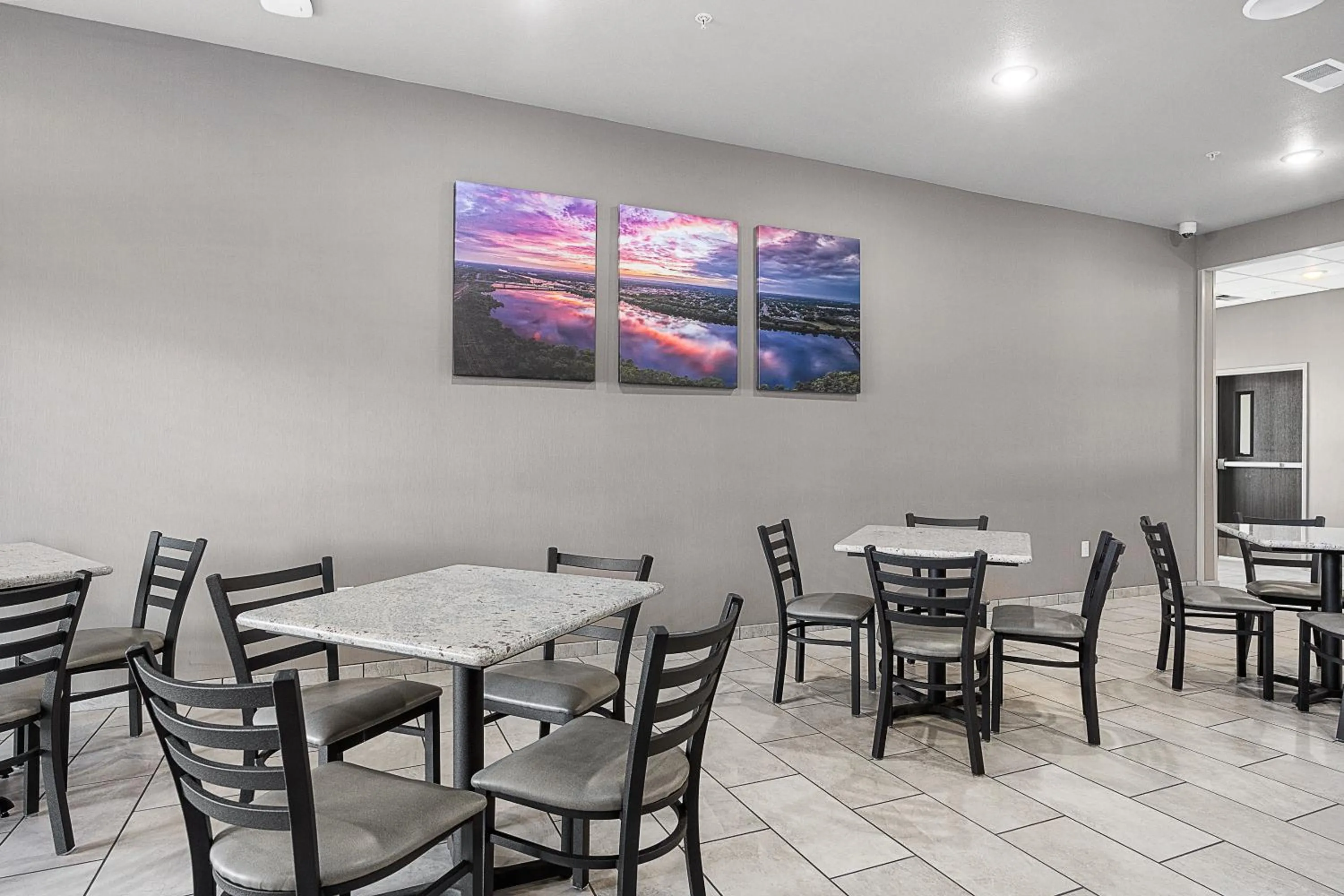 Seating area in Riverstone Suites by Cobblestone Hotels - Chippewa Falls