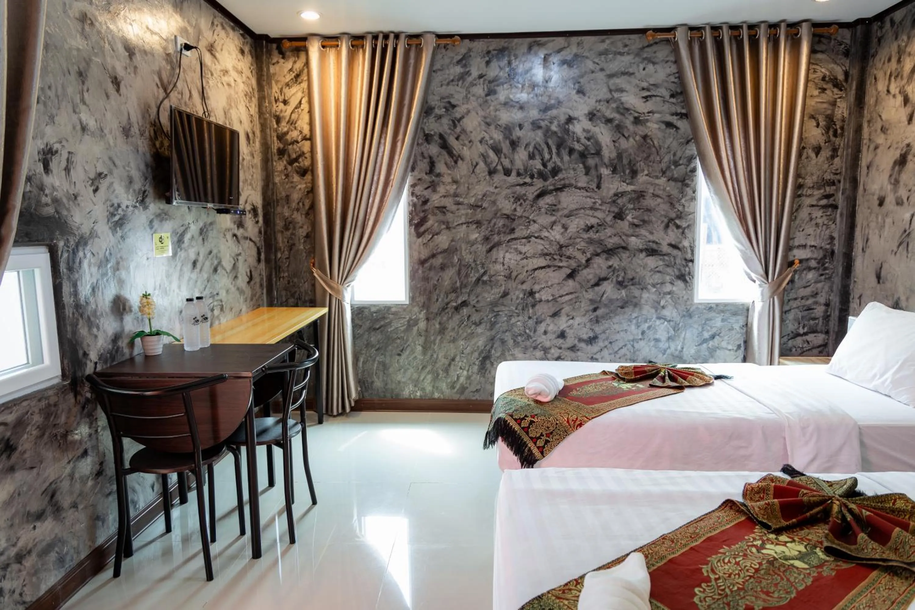 Photo of the whole room, Bed in Buengngarm Resort