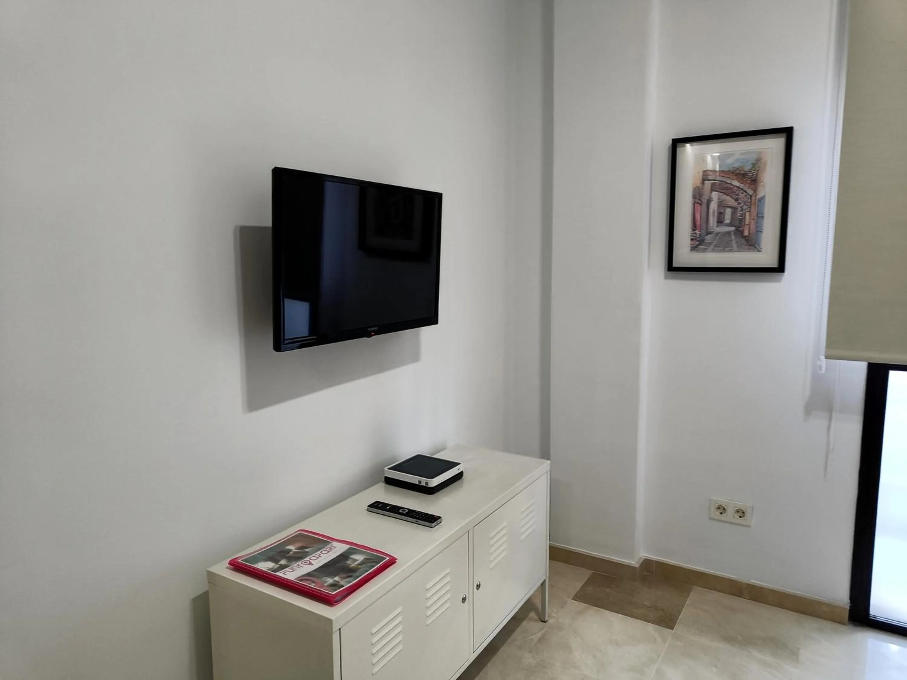 Communal lounge/ TV room in Apartamentos PuntoApart Málaga