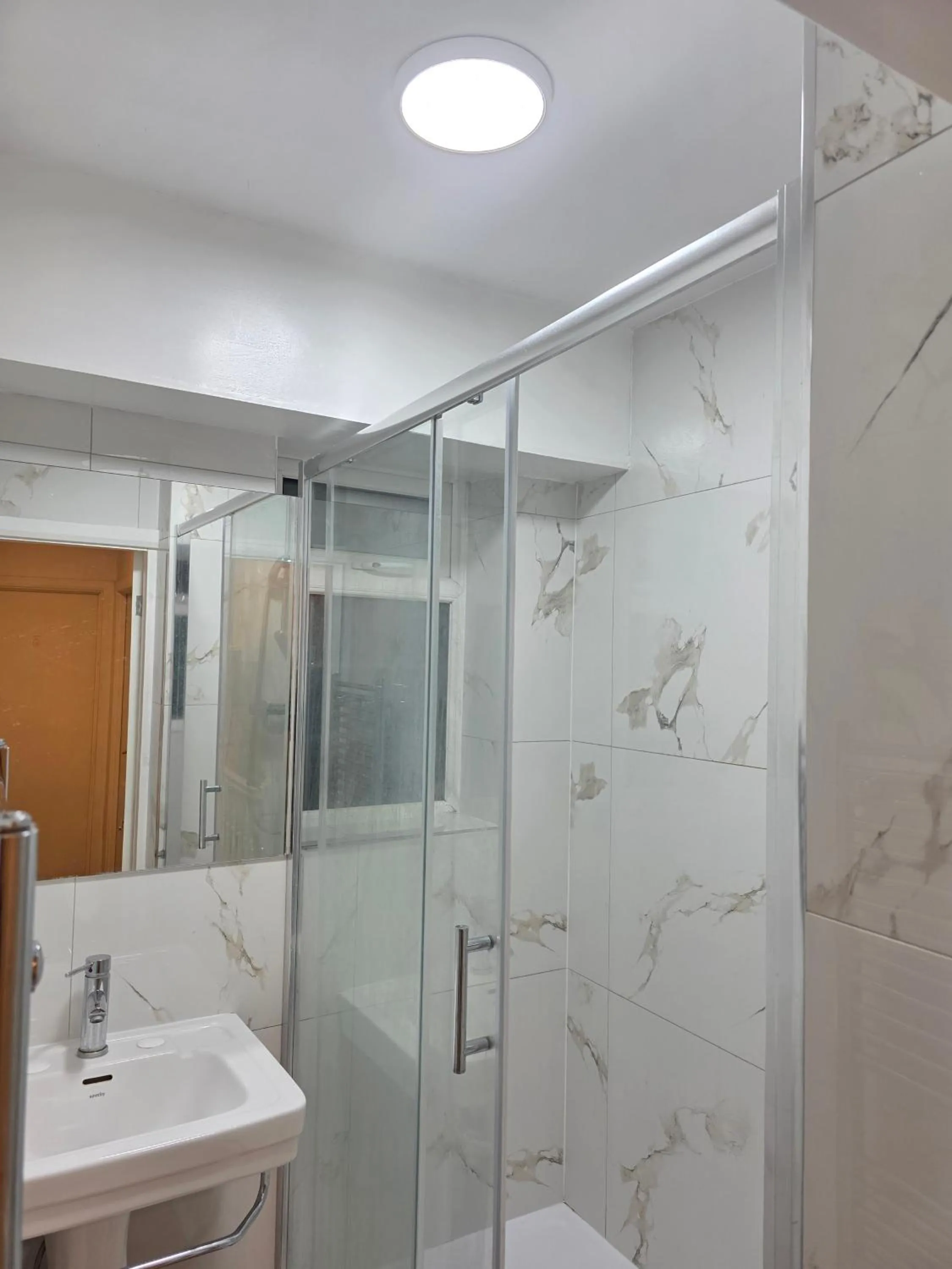 Bathroom in Baraka House Royal Victoria London by OYO