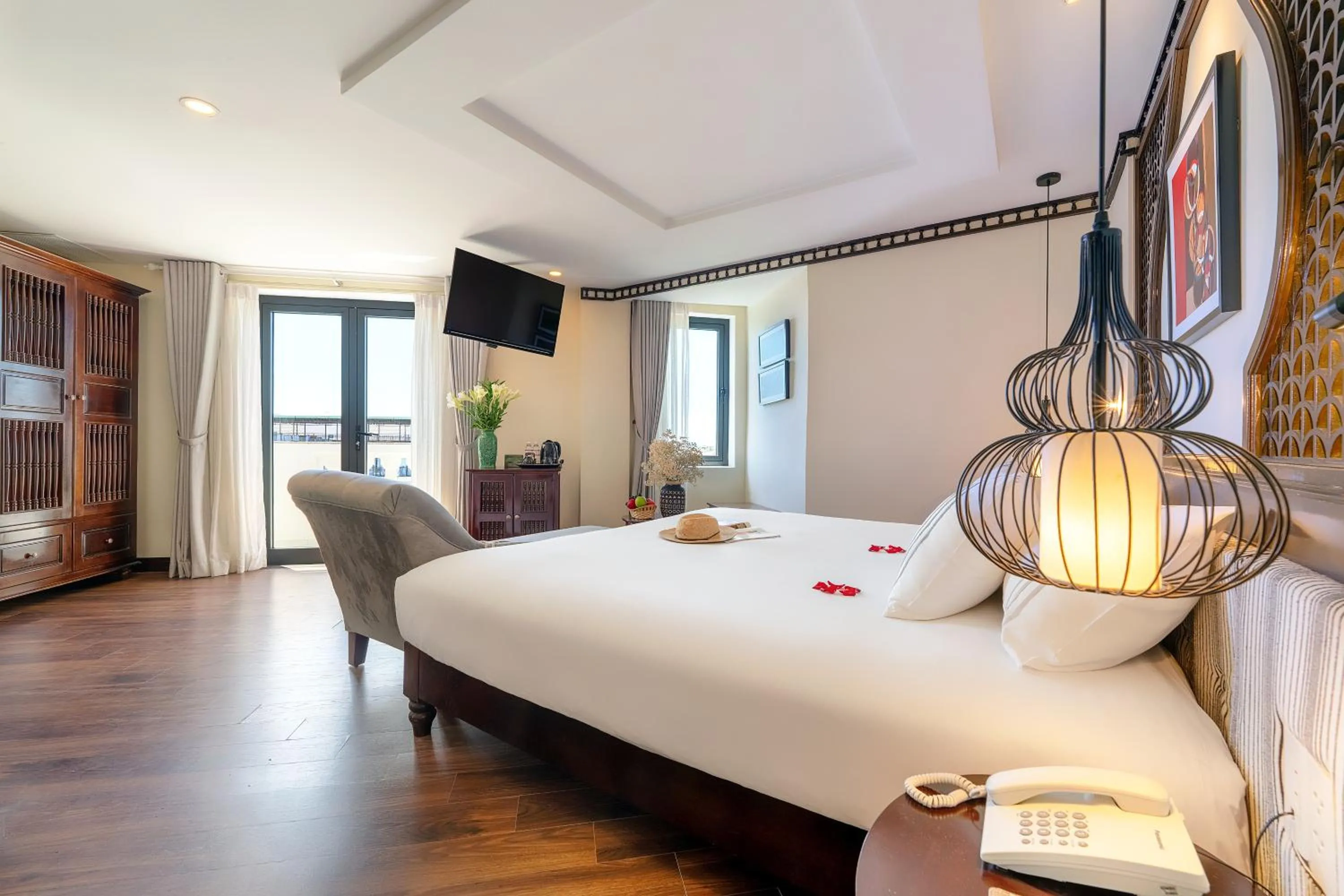 Bed in Qualia De Hôtel Hoi An - Rooftop Bar City View