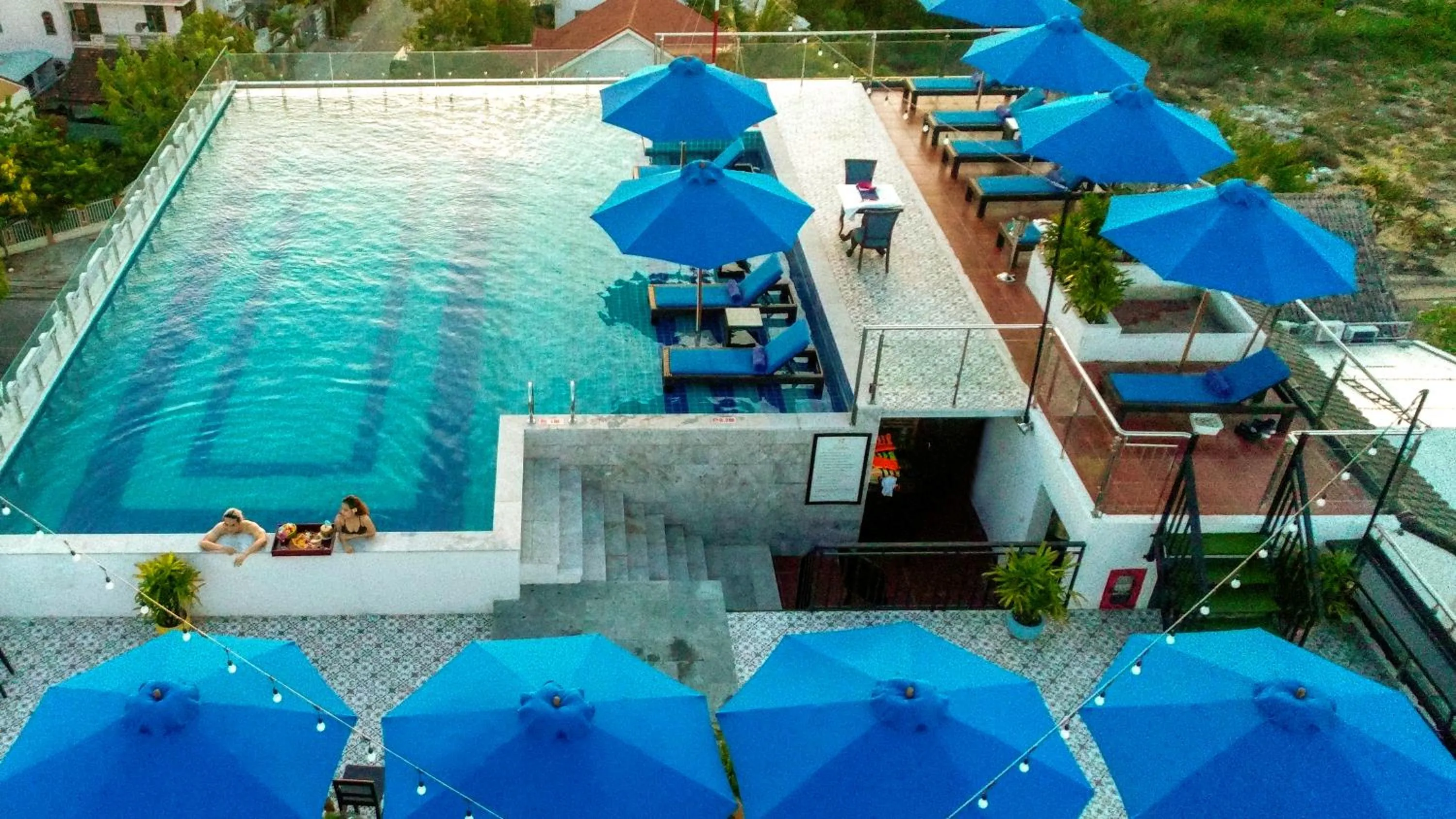 Pool view in Qualia De Hôtel Hoi An - Rooftop Bar City View