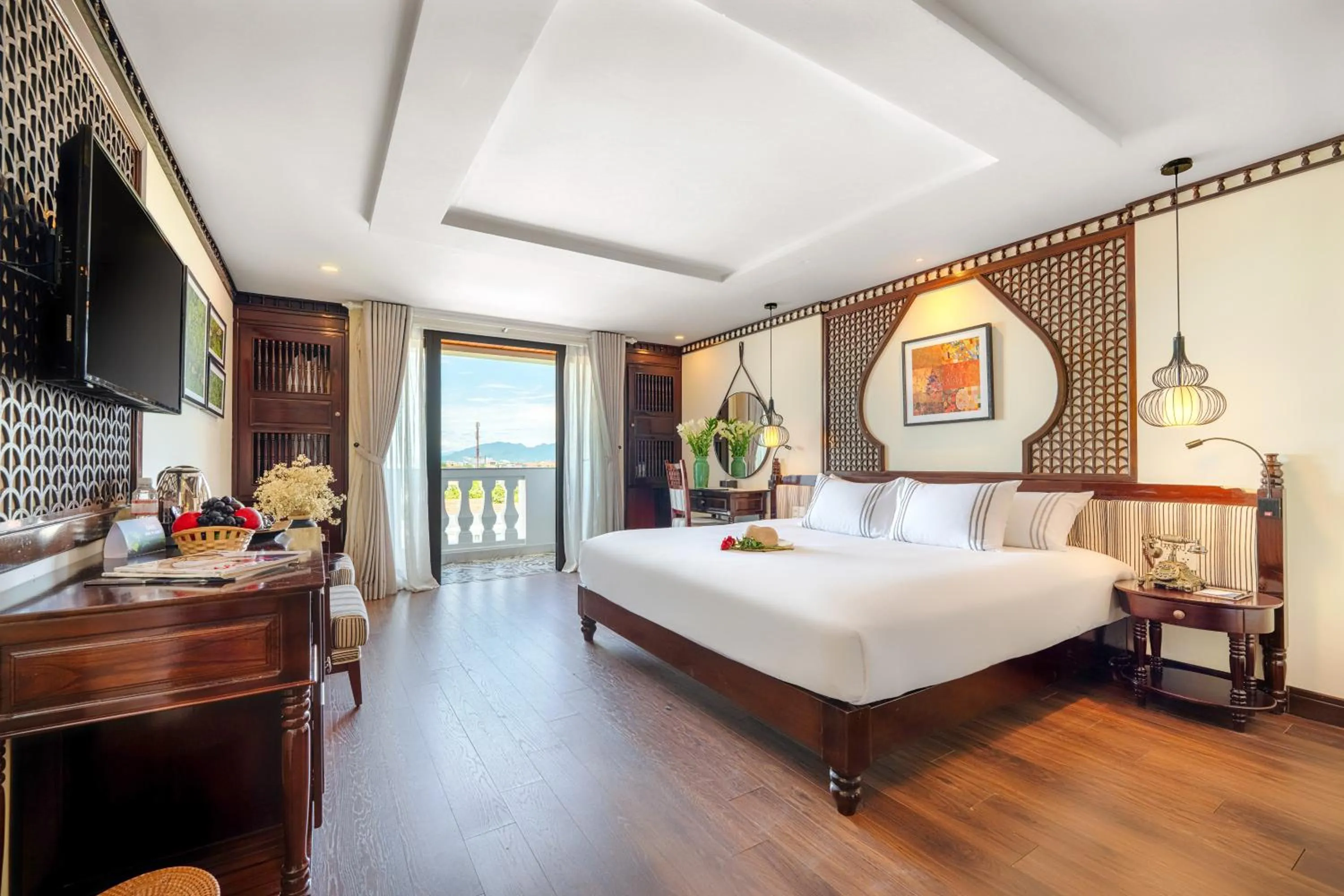 Bed in Qualia De Hôtel Hoi An - Rooftop Bar City View