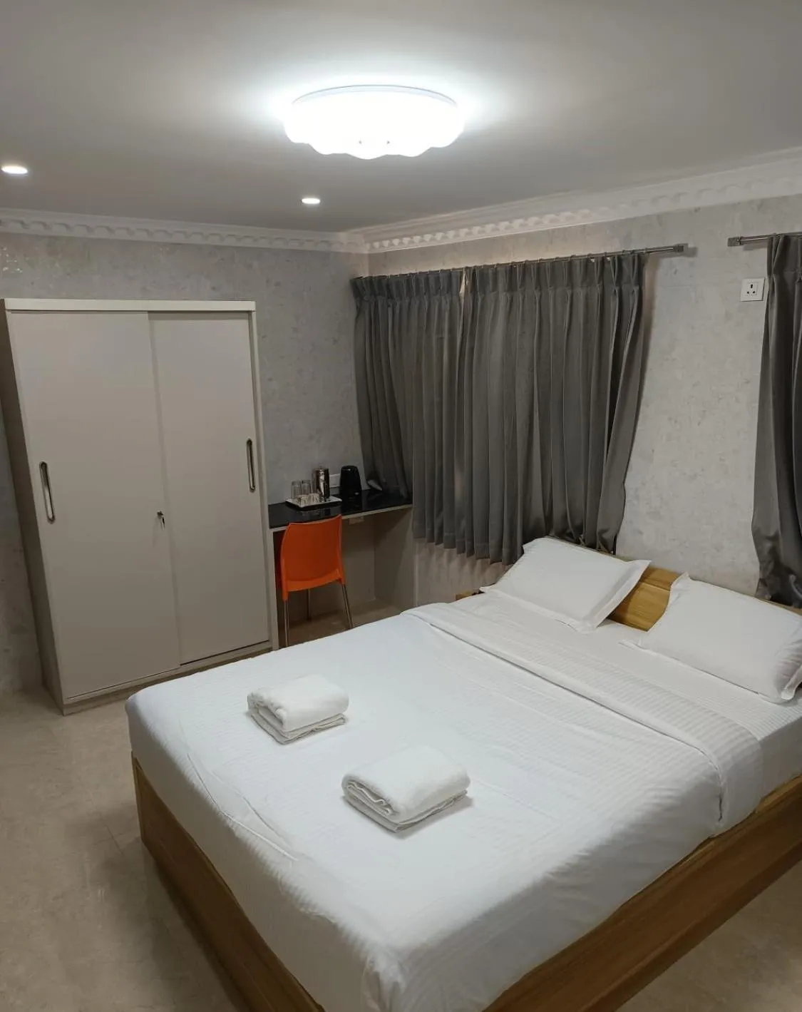 Photo of the whole room, Bed in Arasan Residency