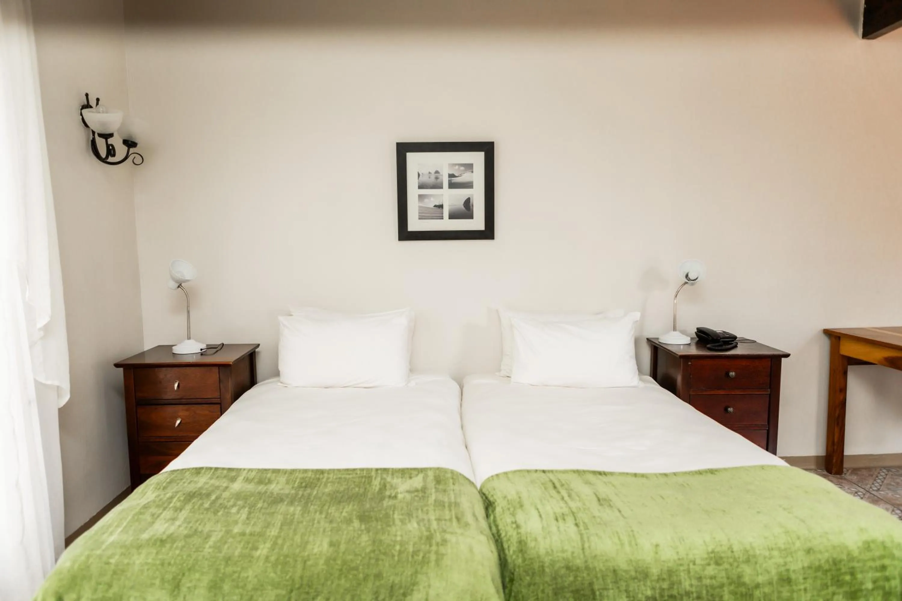 Bed in Casa Blanca Boutique Hotel