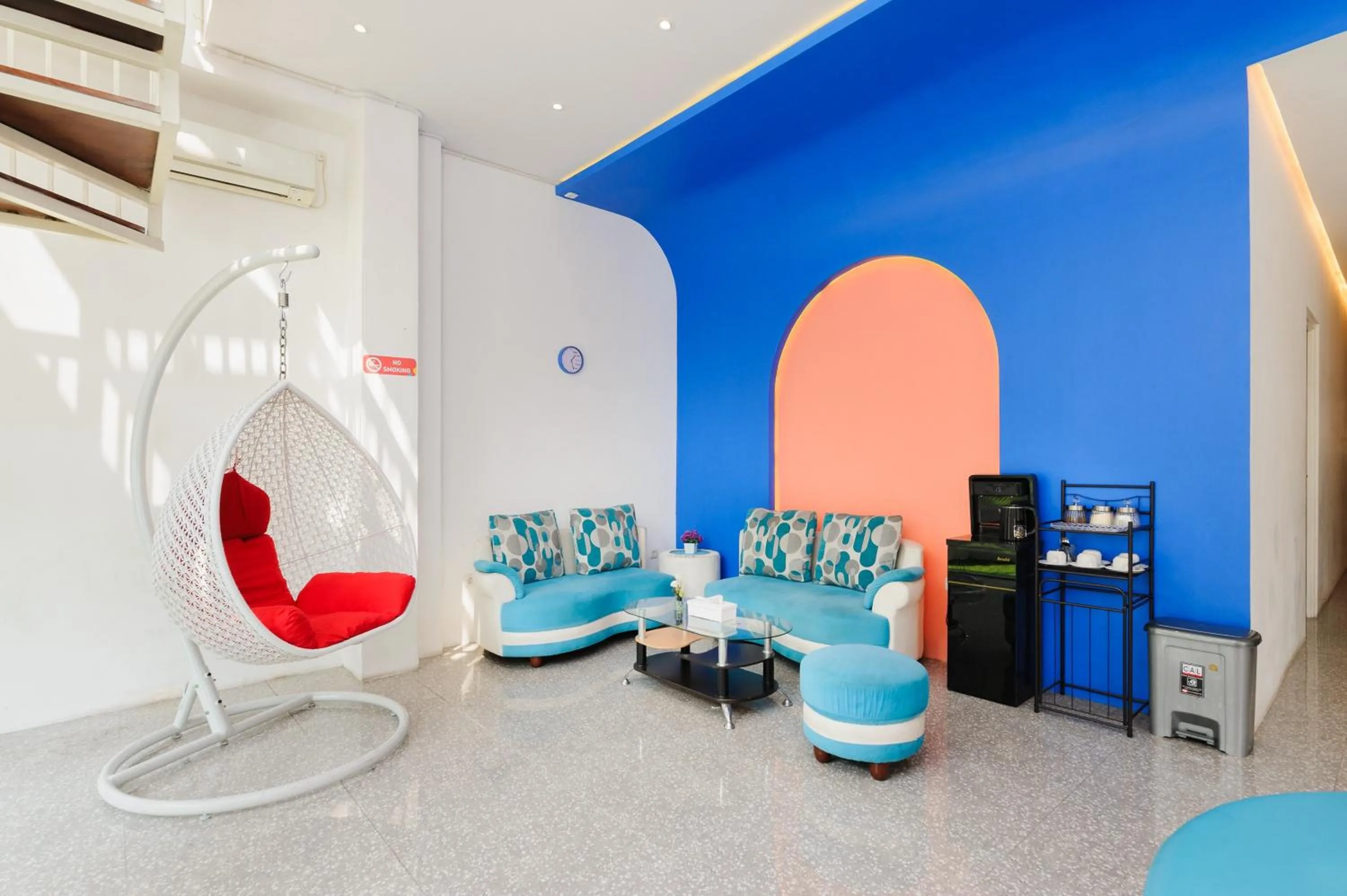 Seating area in Sans Hotel La Vida Malang