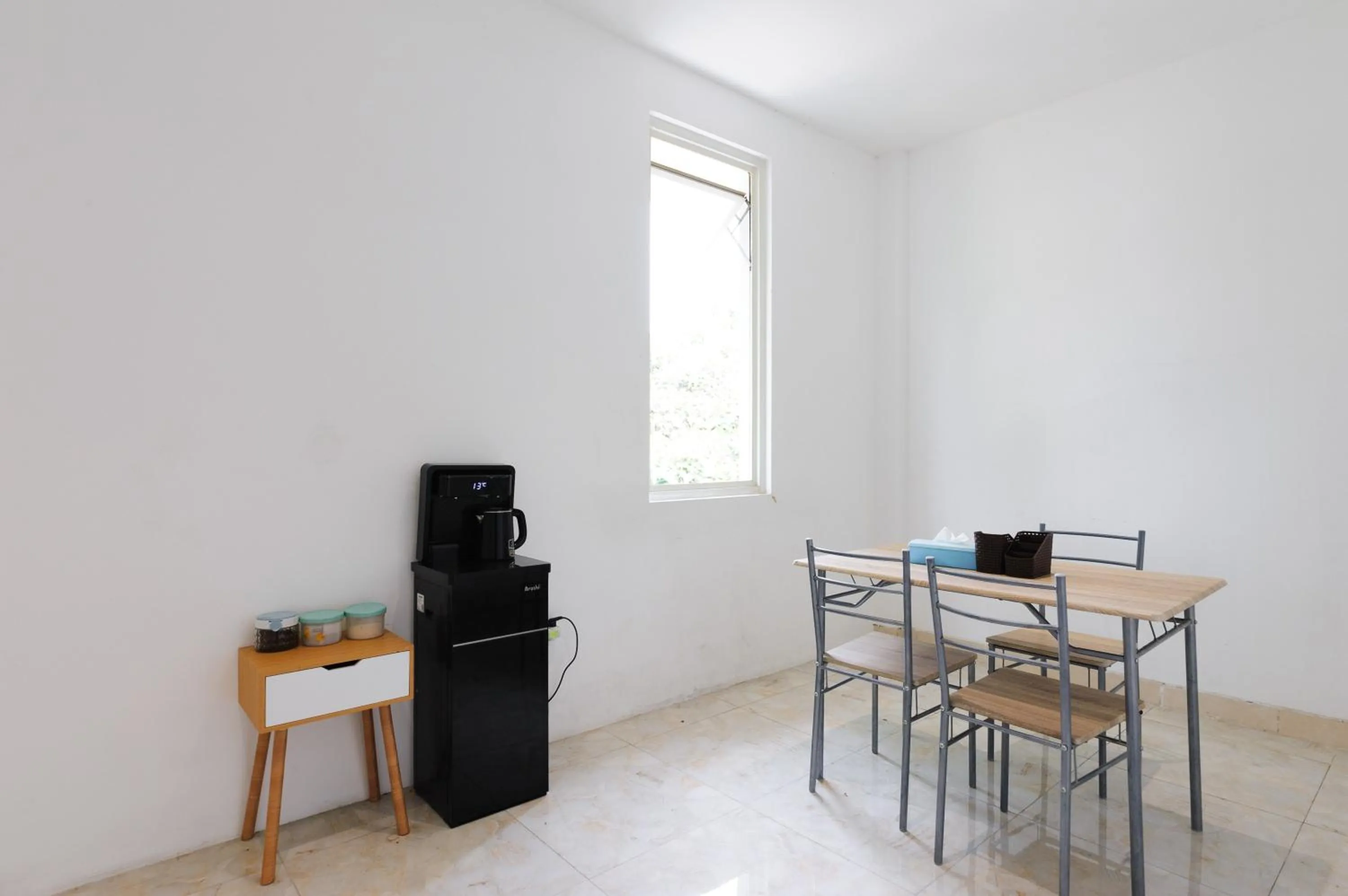 Seating area in Sans Hotel La Vida Malang