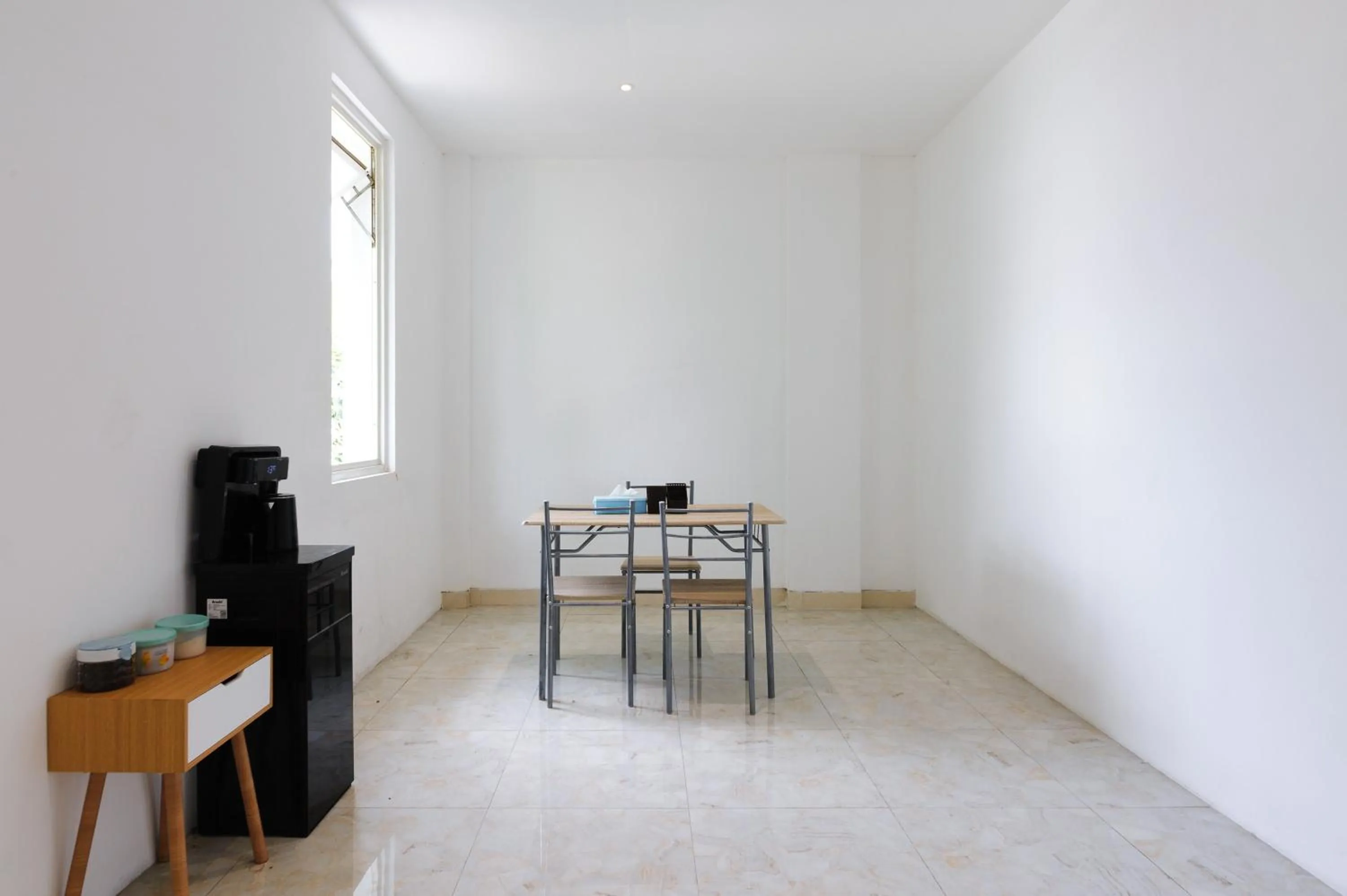 Seating area in Sans Hotel La Vida Malang