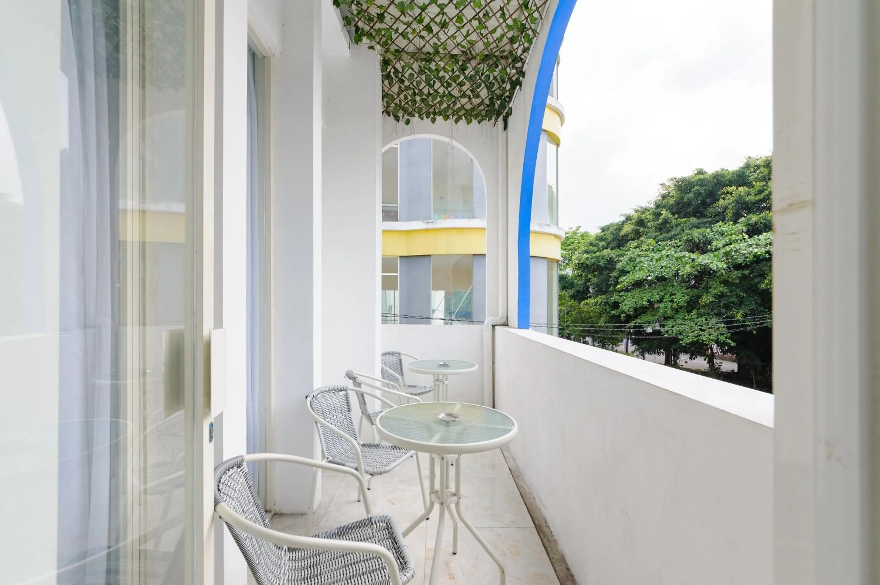 Seating area in Sans Hotel La Vida Malang