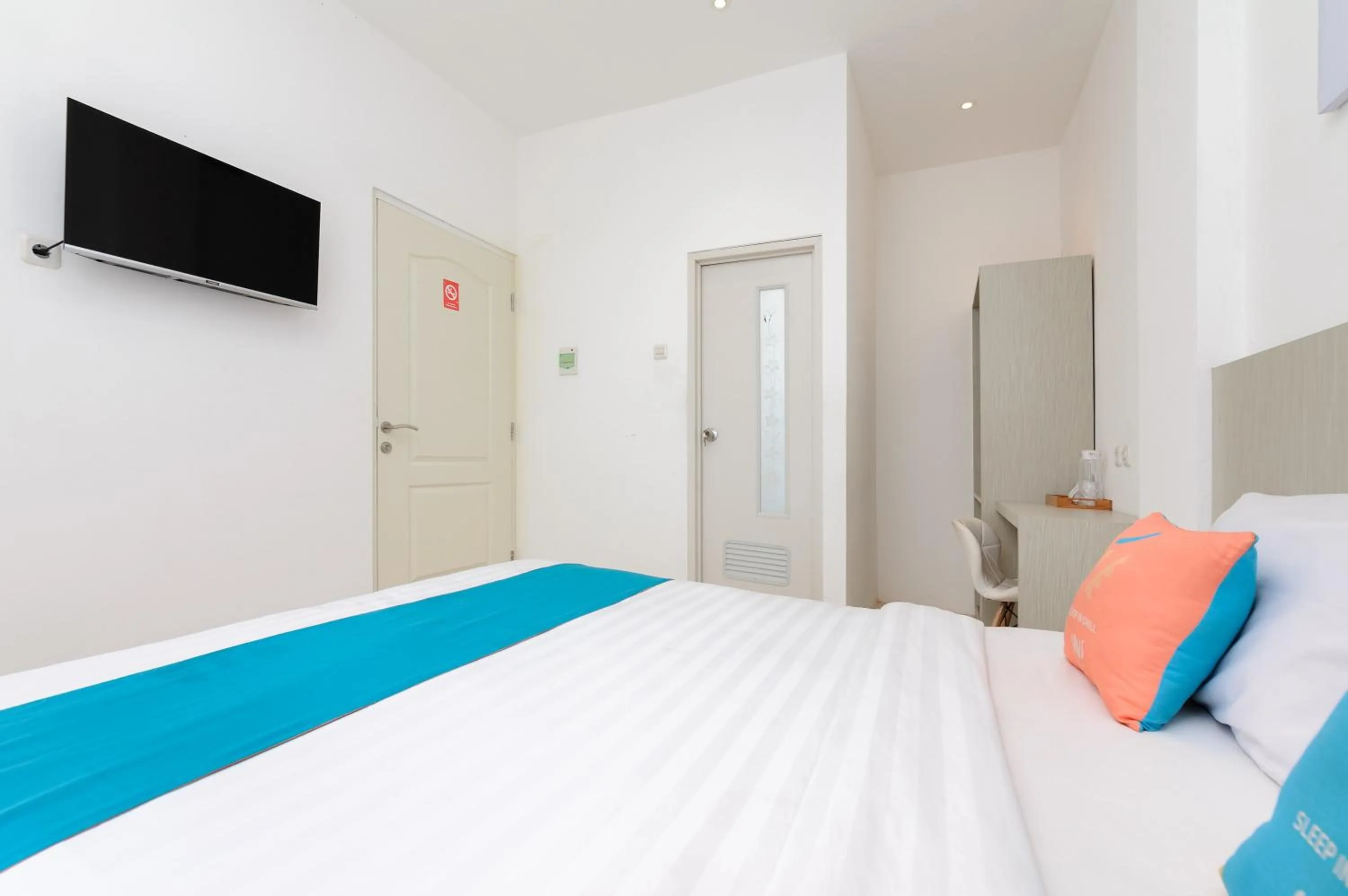 Bedroom, Bed in Sans Hotel La Vida Malang