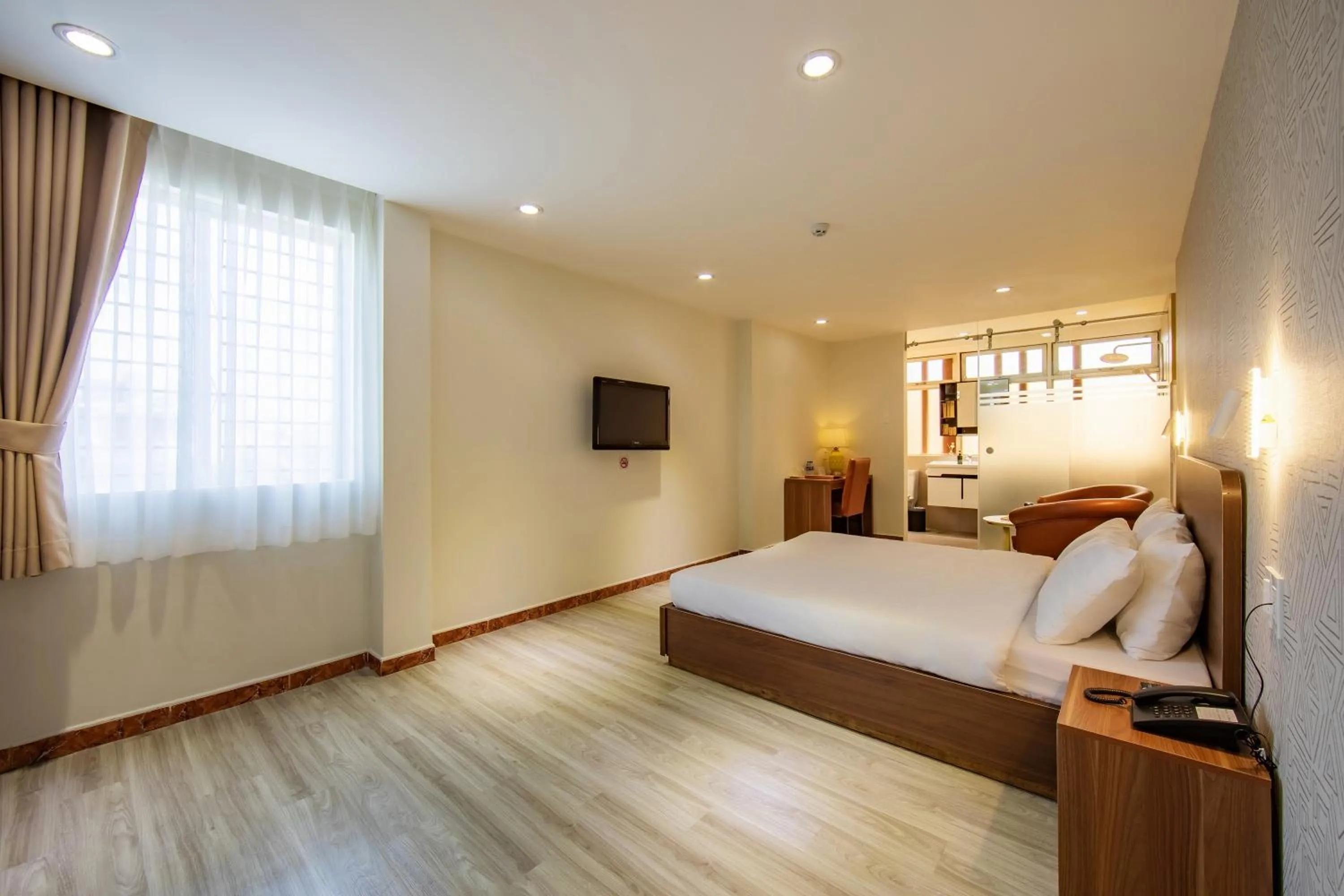 Bed in Lanura Saigon Boutique Hotel