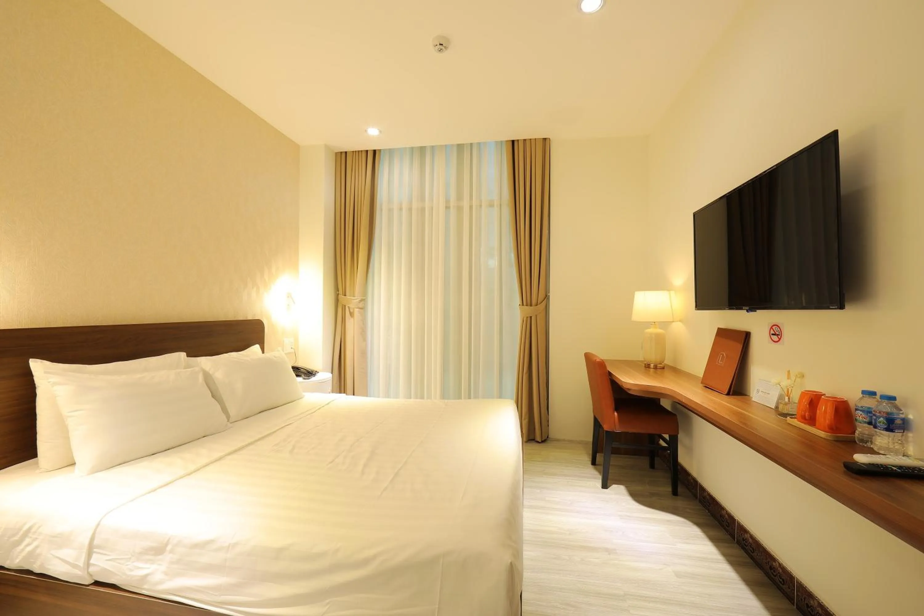 Bed in Lanura Saigon Boutique Hotel