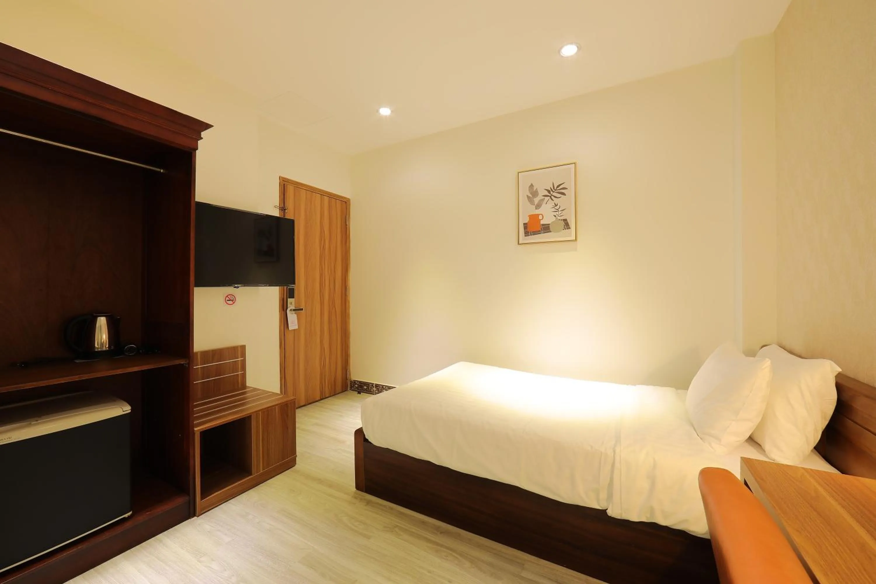 Bed in Lanura Saigon Boutique Hotel