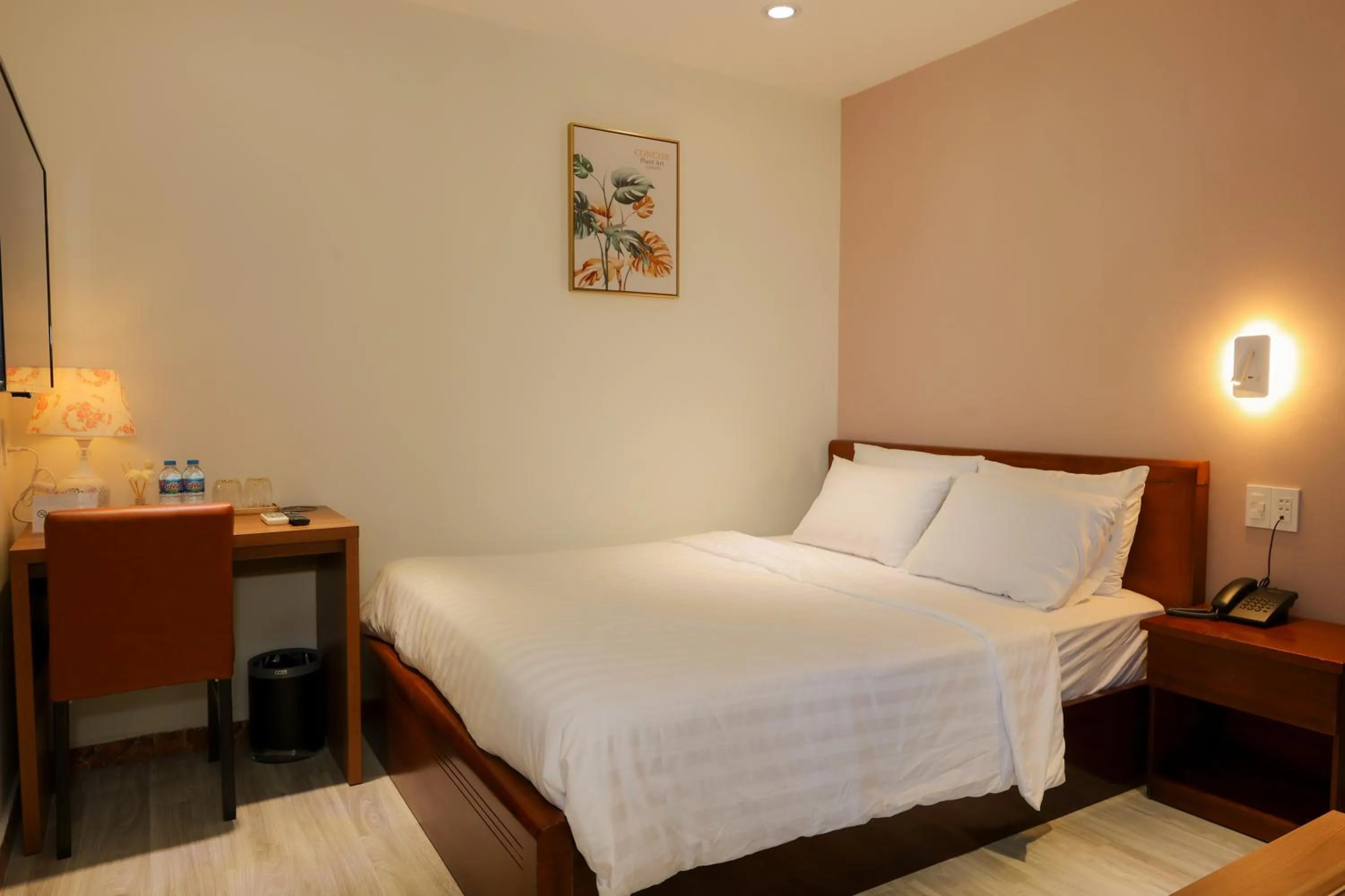 Bed in Lanura Saigon Boutique Hotel