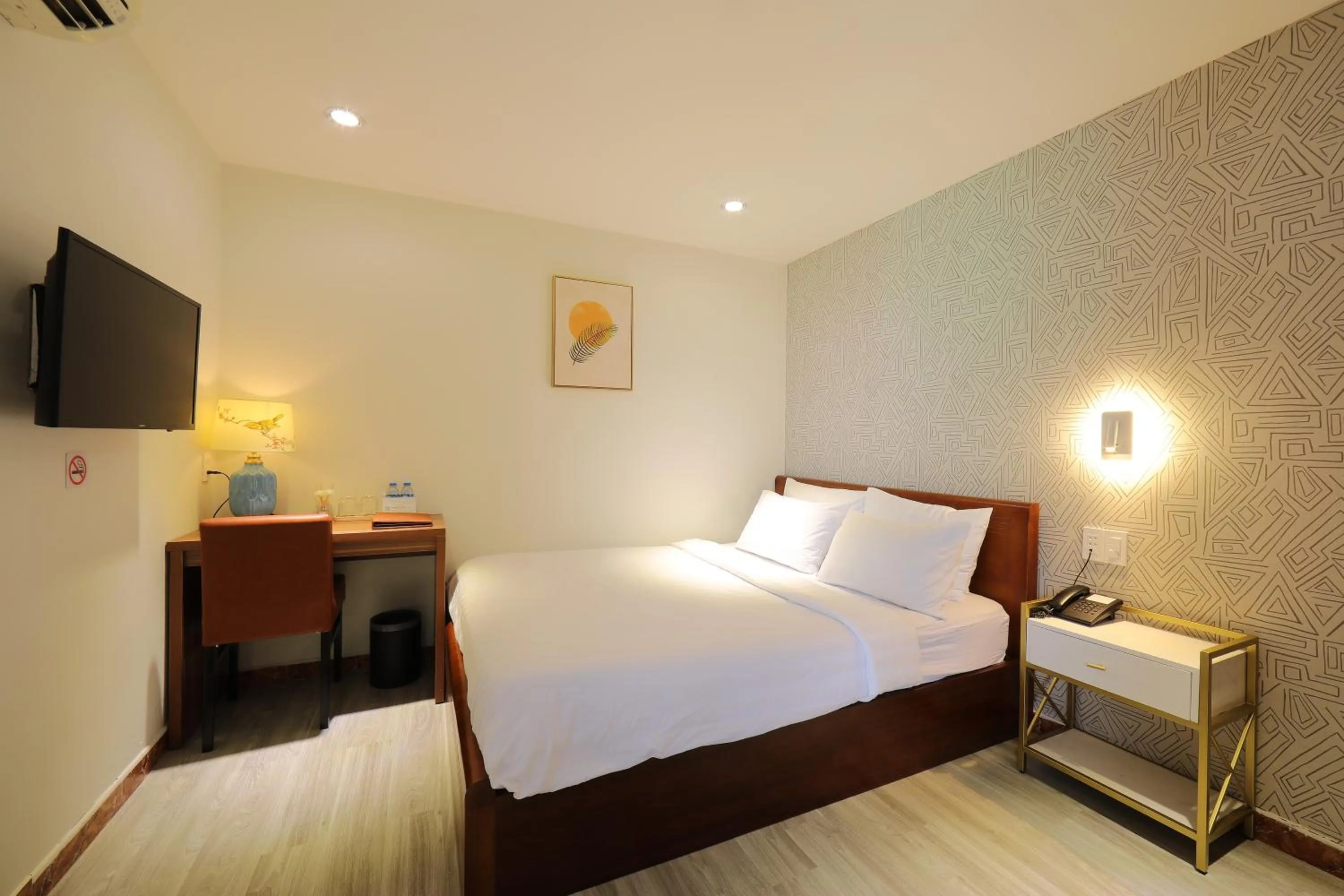 Bed in Lanura Saigon Boutique Hotel