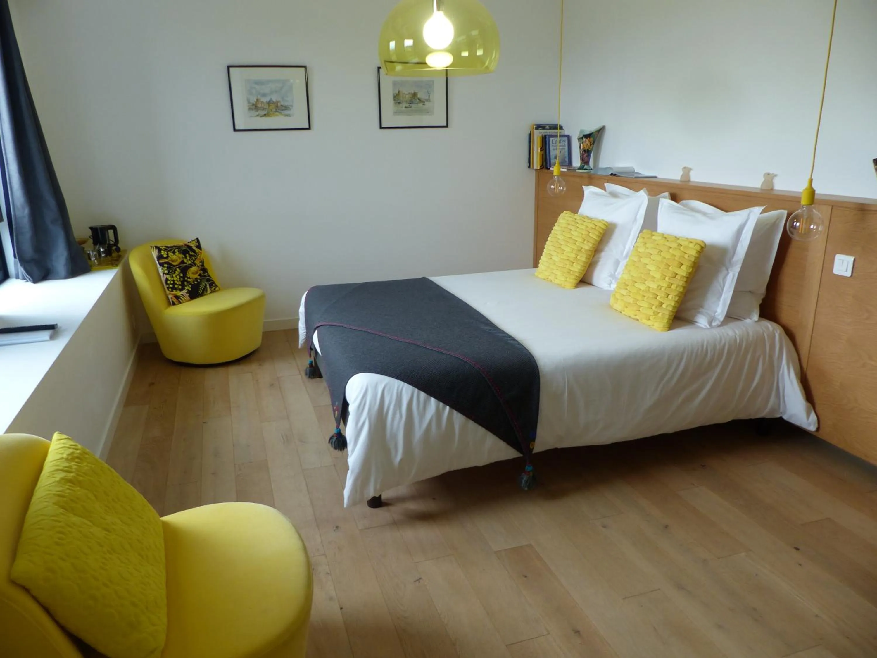 Bed in Les Chambres d'hôtes de Kérasquer