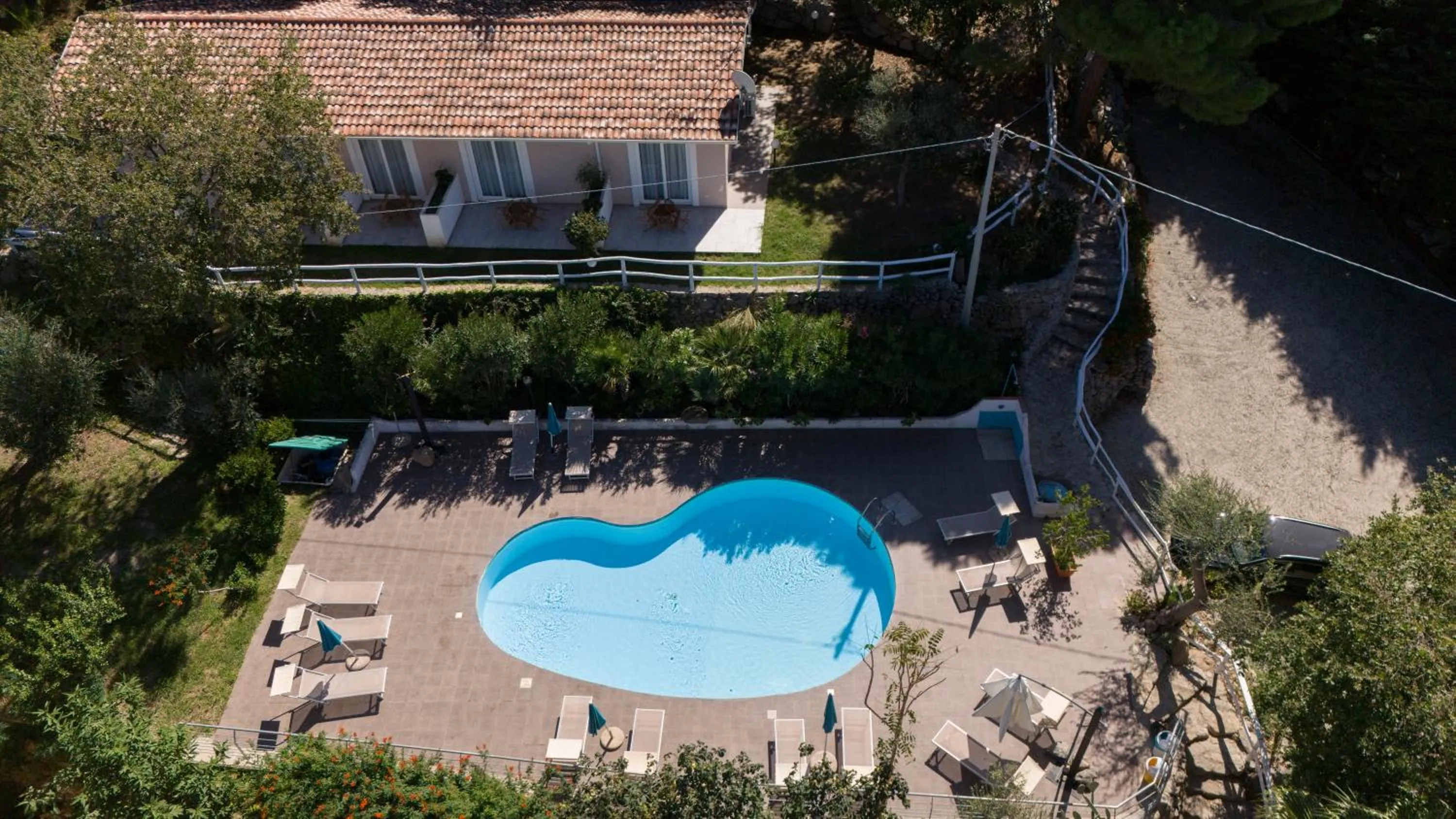 Pool view in UNICO Cannamele Escape Tropea by Life Resorts