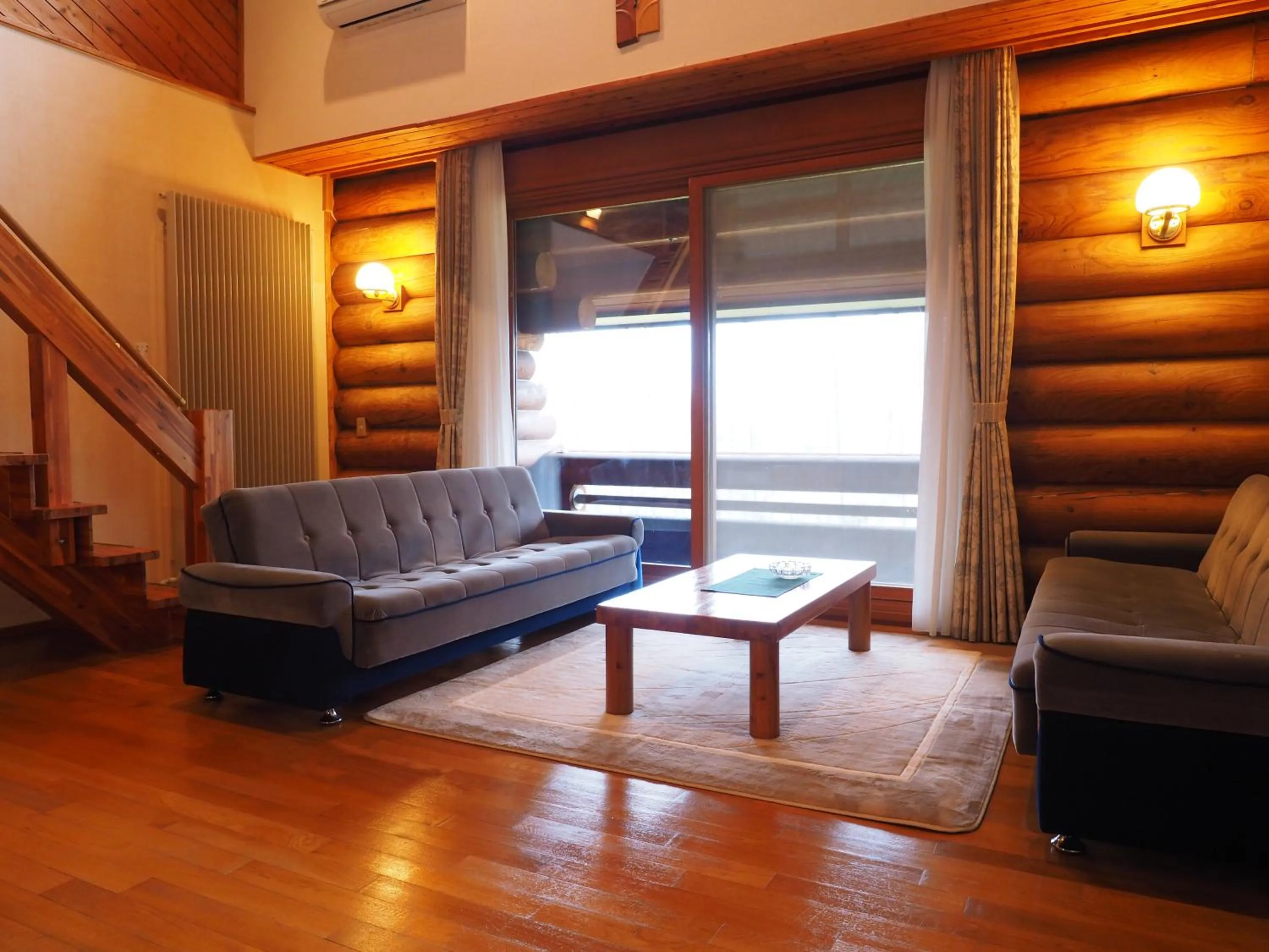 Seating area in Log Hotel Larch Lake Kanayama