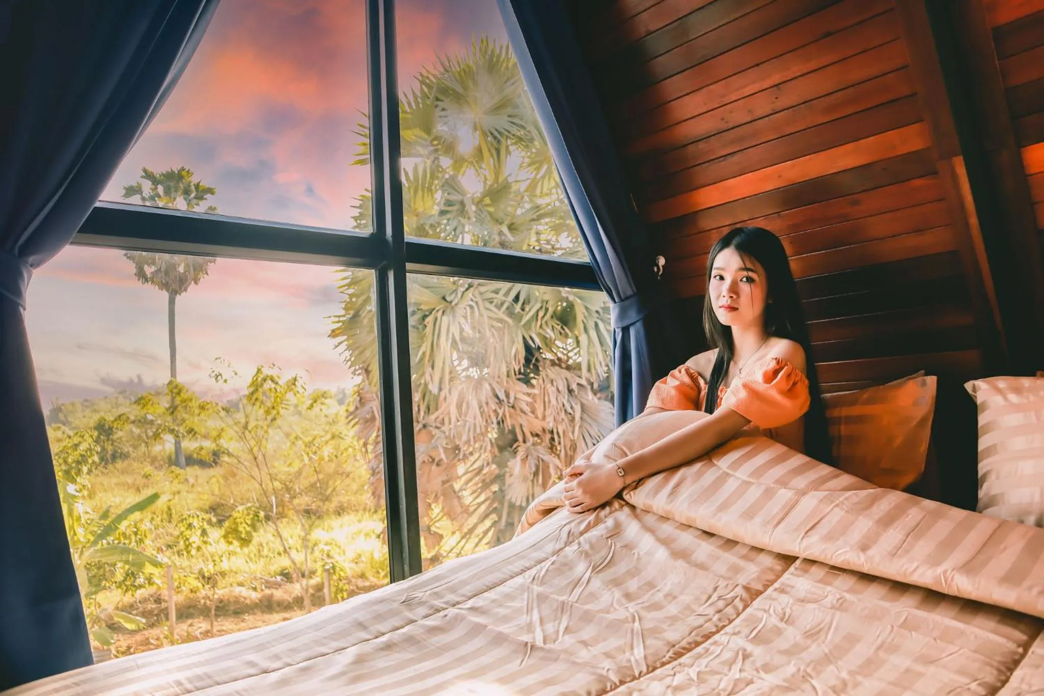 Bed in Nakara Villas & Glamping Udon Thani