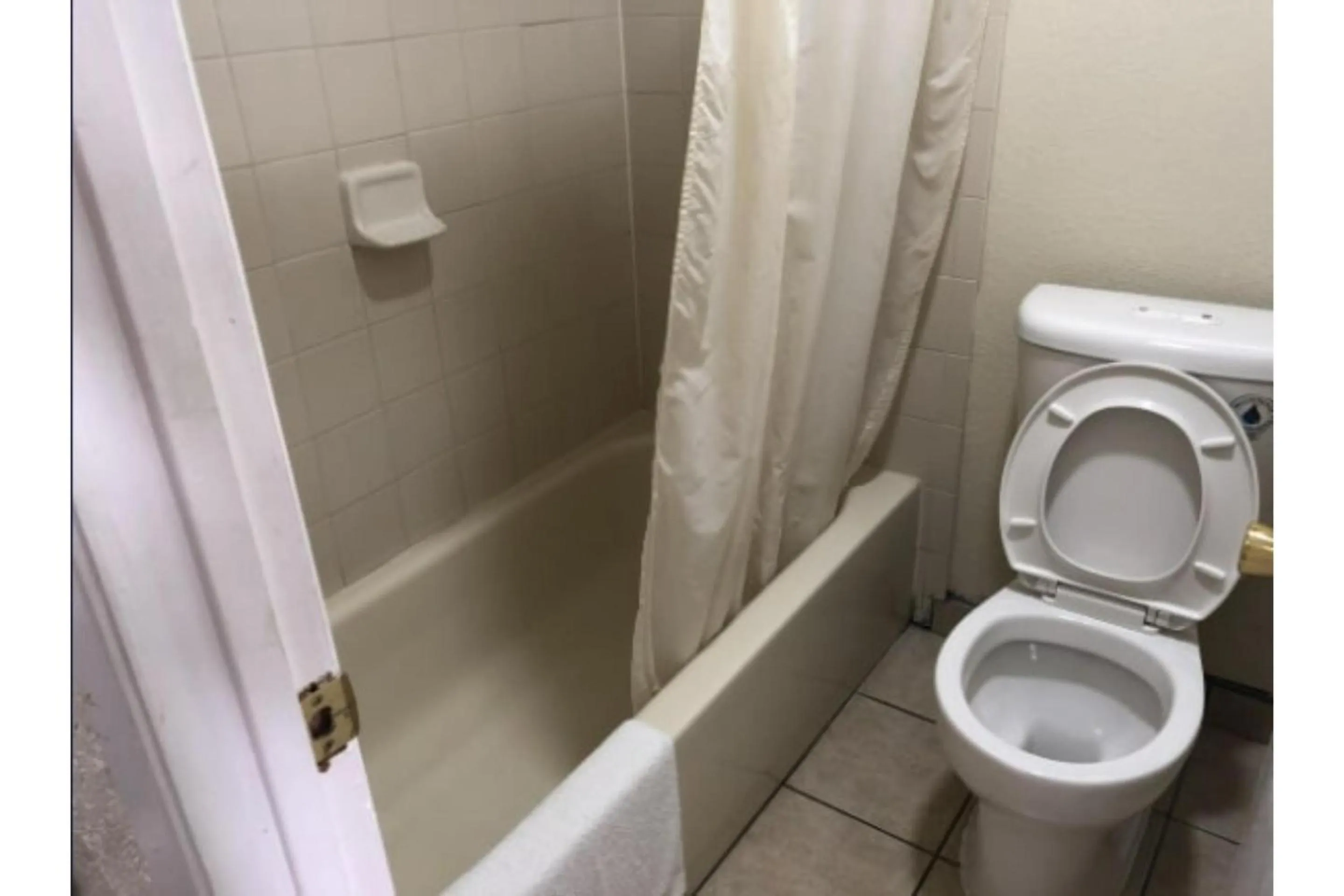 Bathroom in Golden Inn Dallas by Hotel O