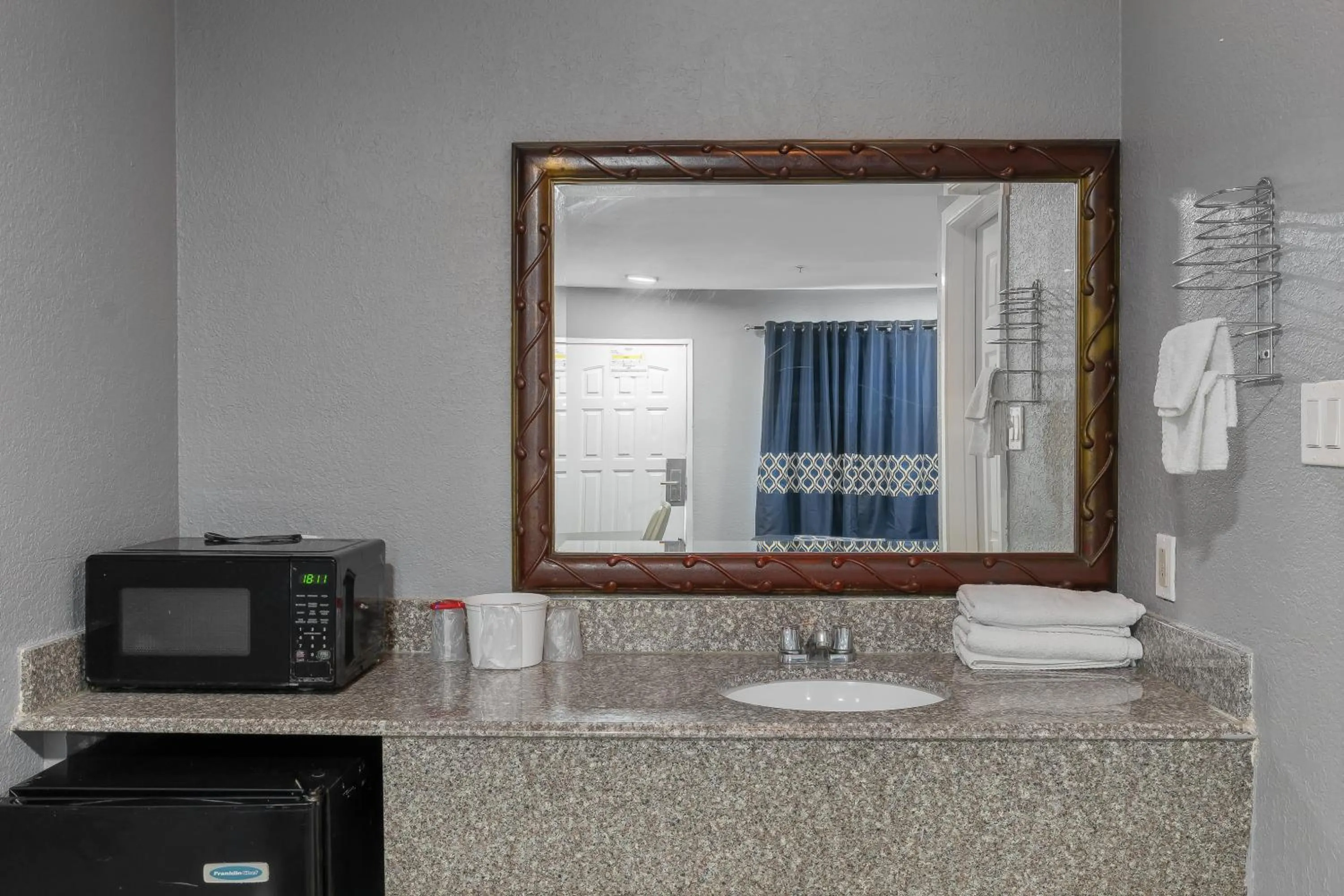 Bathroom in Golden Inn Dallas by Hotel O