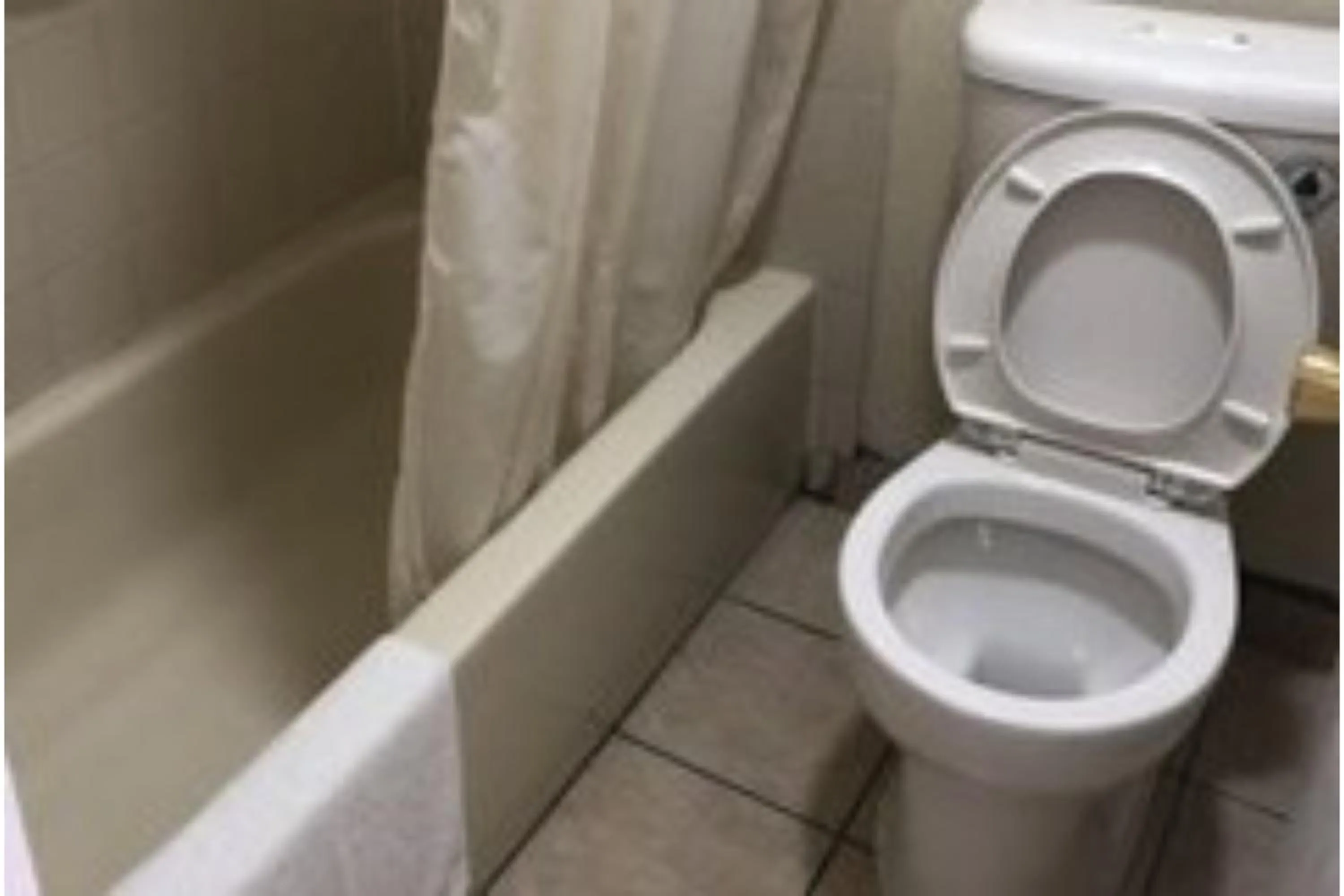 Bathroom in Golden Inn Dallas by Hotel O